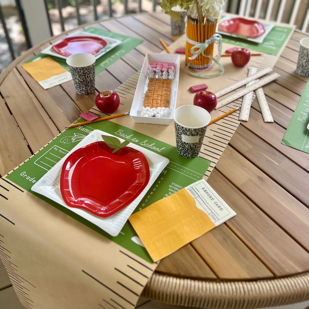 This set of 8 square plates, designed to look like notebook paper, is perfect for a school-themed celebration.