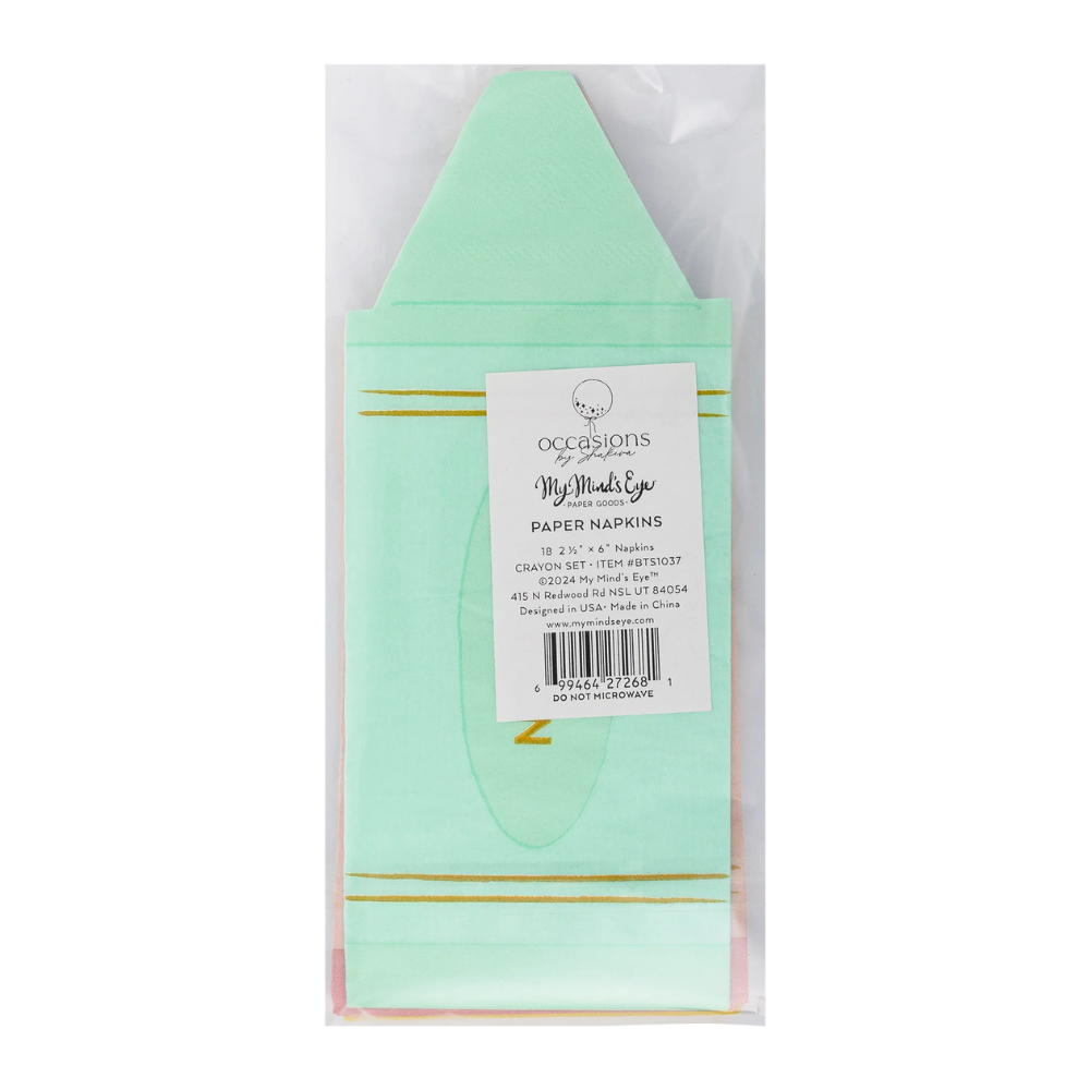 Green crayon napkin showing through clear product packaging with barcode and manufacturing label visible.