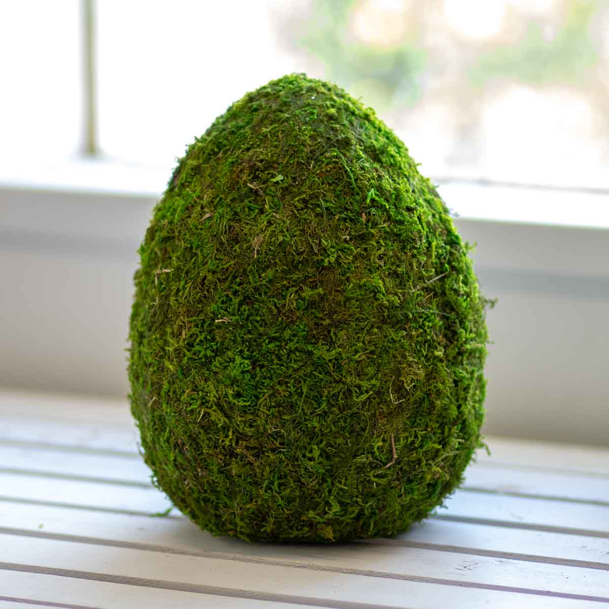 Moss green eggs for spring table decorations or an Easter tablescape.
