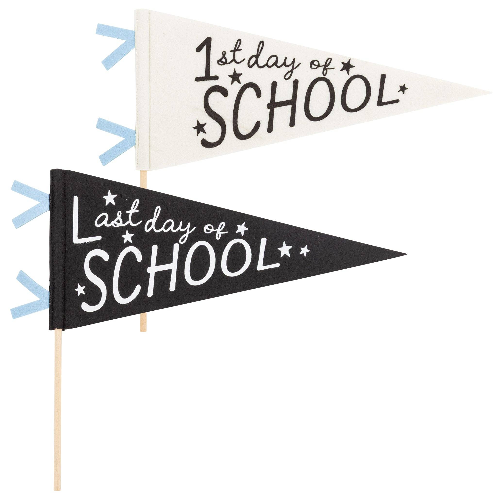 Flat lay of both 1st Day of School and Last Day of School felt pennants side by side on a white background showing cream and black colorways with wooden dowels
