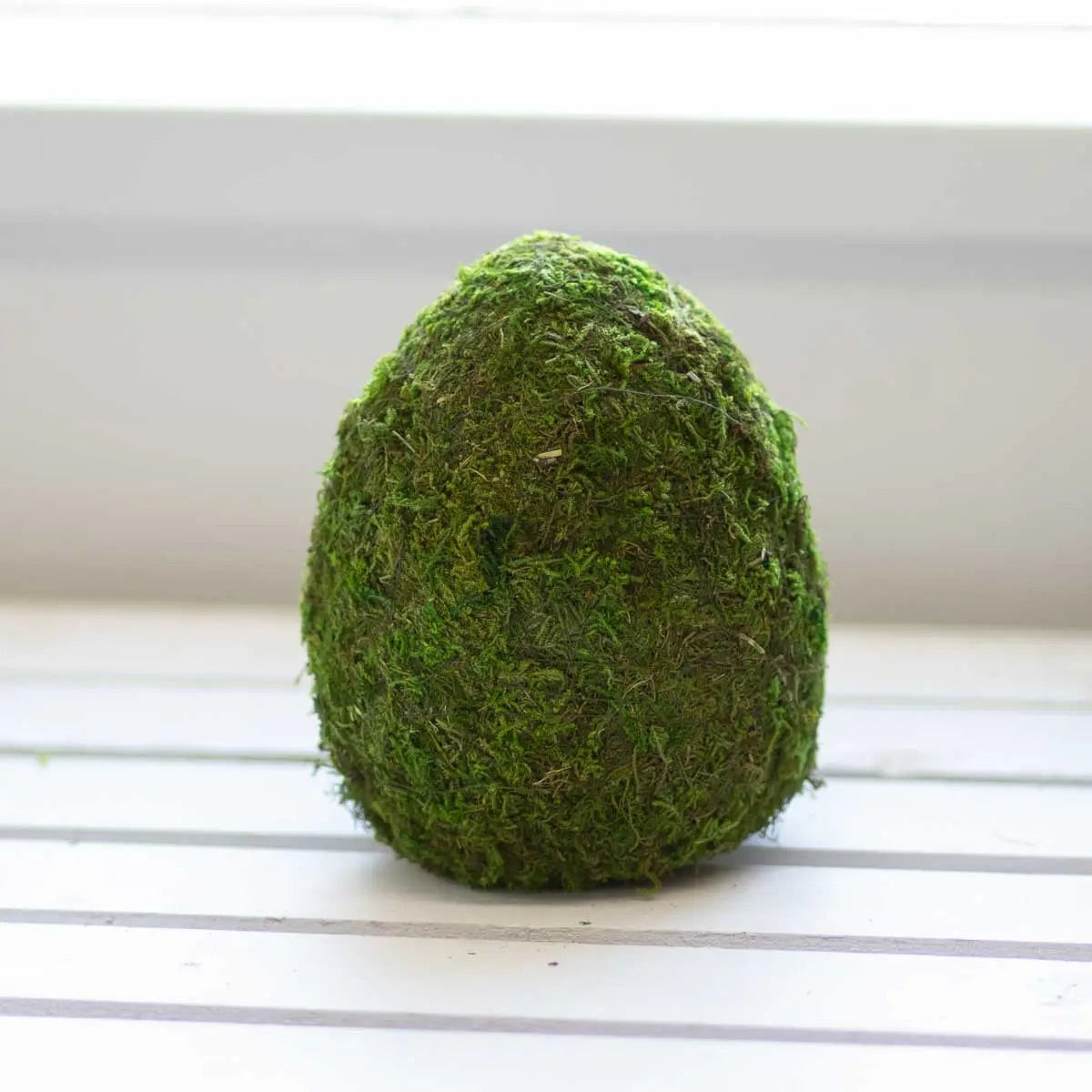 Moss green eggs for spring table decorations or an Easter tablescape.