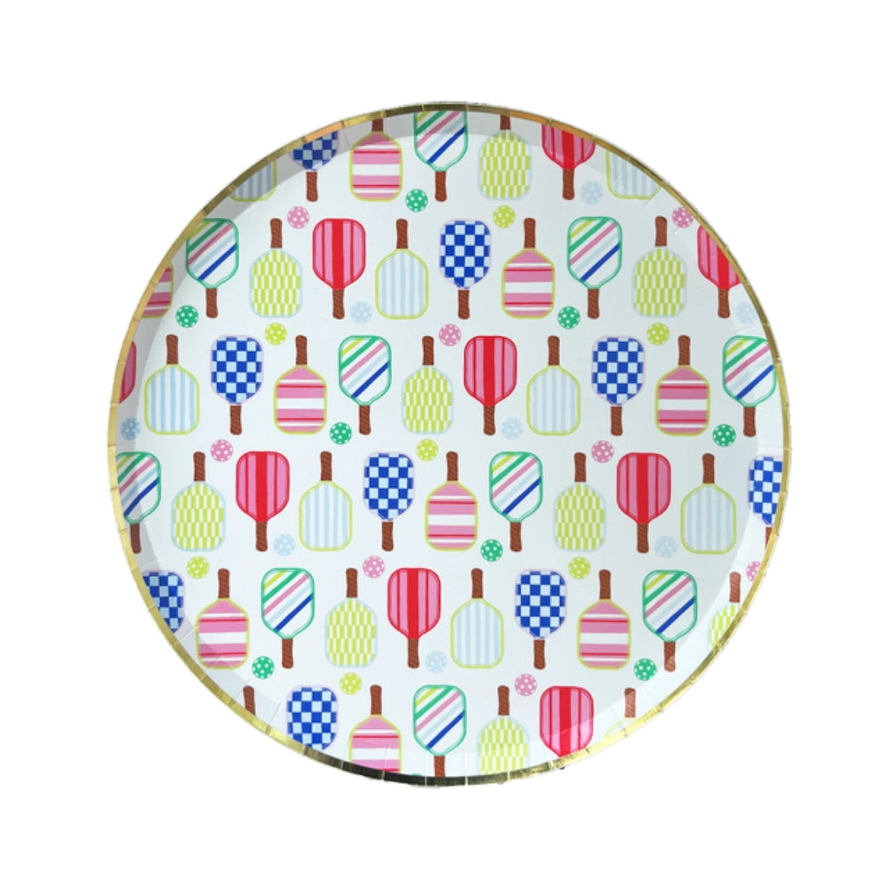 Isolated 10‑inch dinner plate featuring checkerboard, striped, and solid paddle prints with gold foil edge.