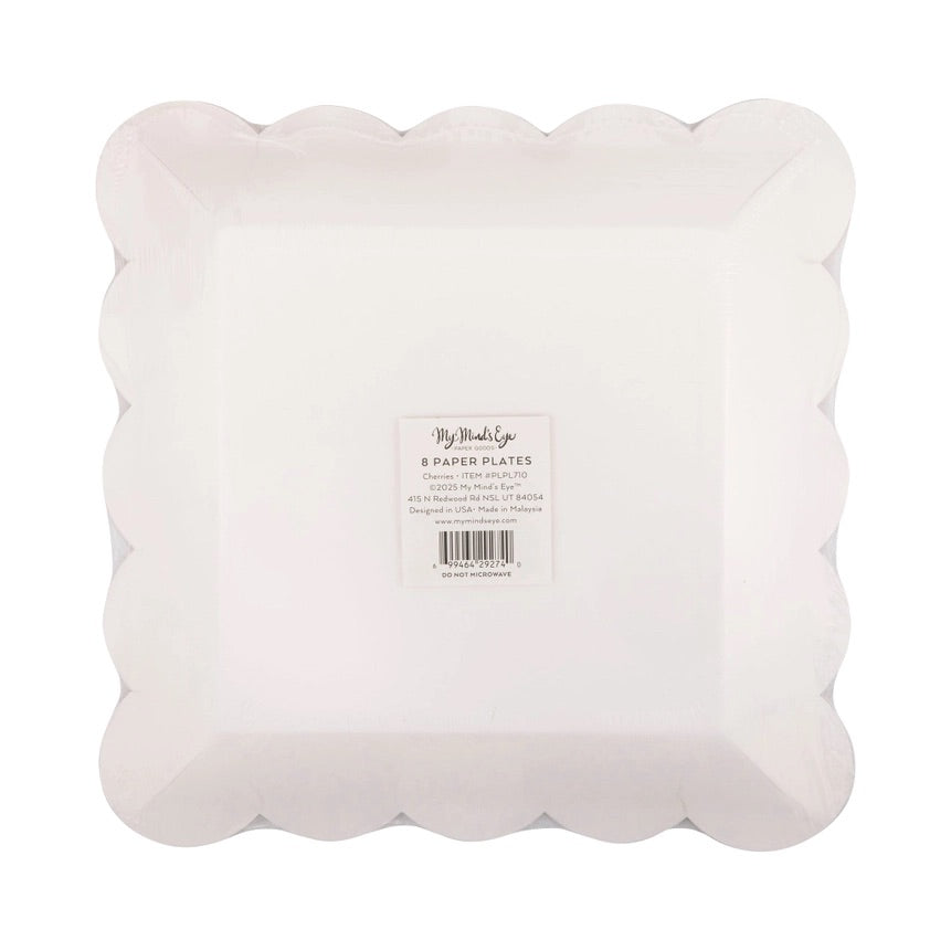 Back of package showing white scalloped paper plates labeled with product information for cherry party decorations.