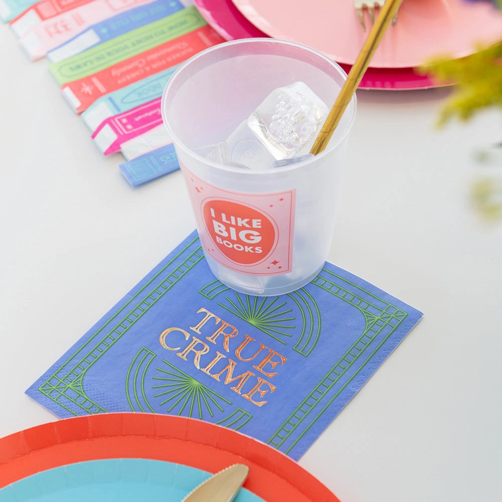 Book-themed cocktail napkin featuring 'True Crime' paired with a humorous cup that says 'I like big books.'