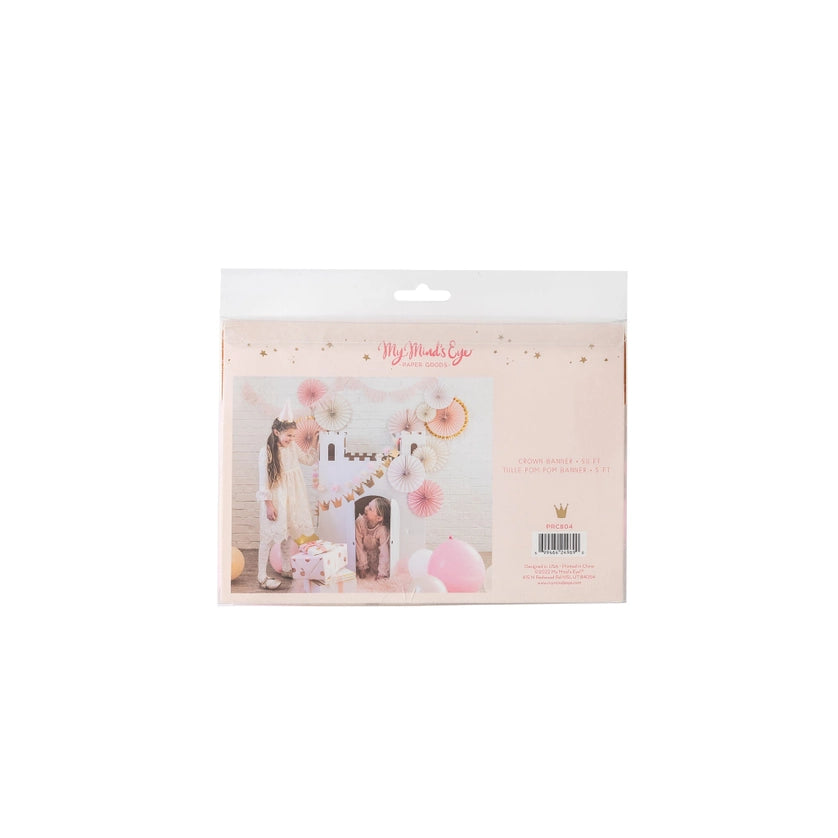 Back of retail package showing styled castle scene with crown & pom banners plus product barcode.