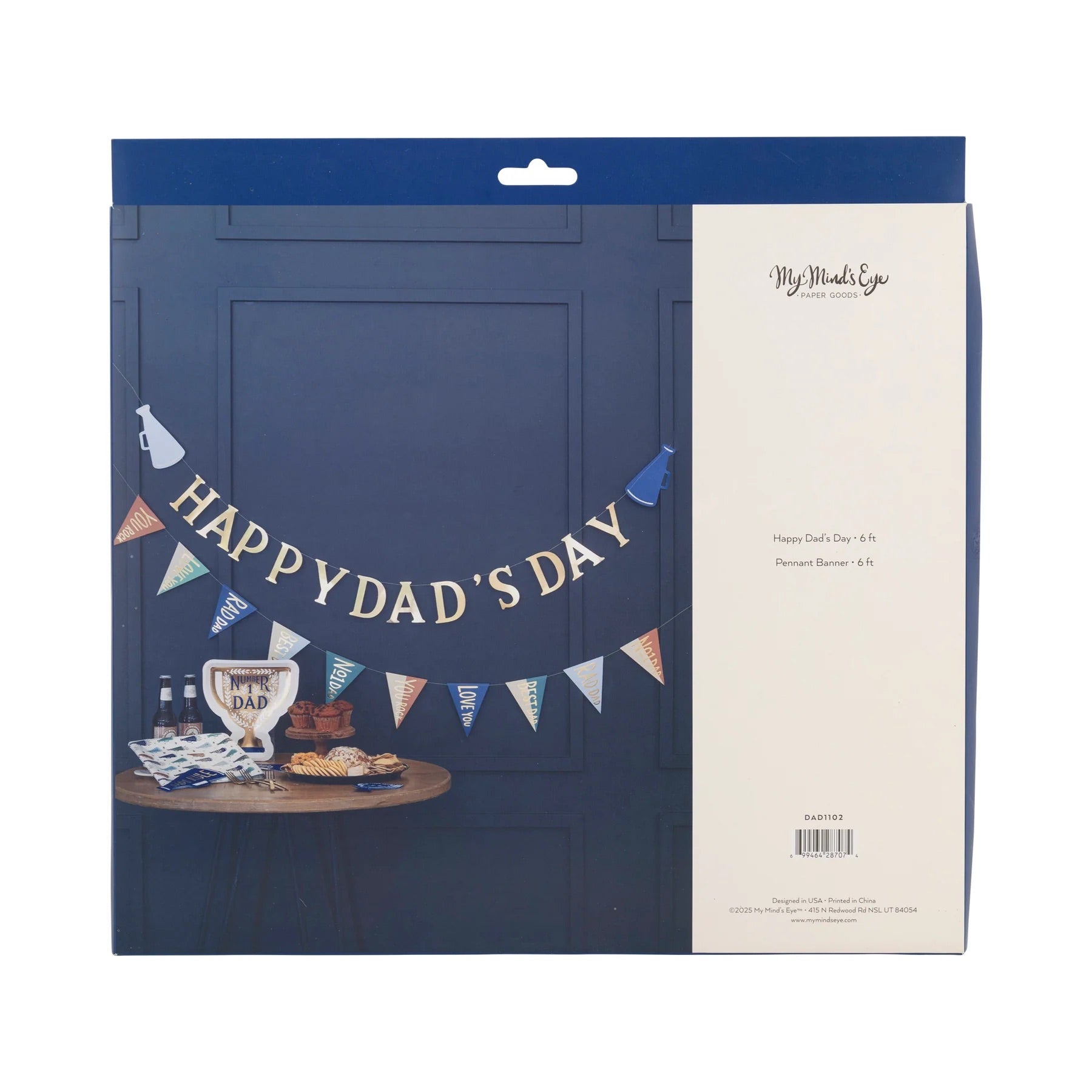 The front of the package showing gold foil “DAD” letters and colorful pennant flags.