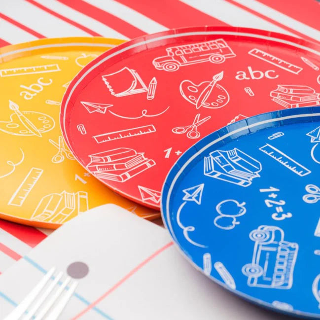 Close‑up yellow, red, blue school plates.