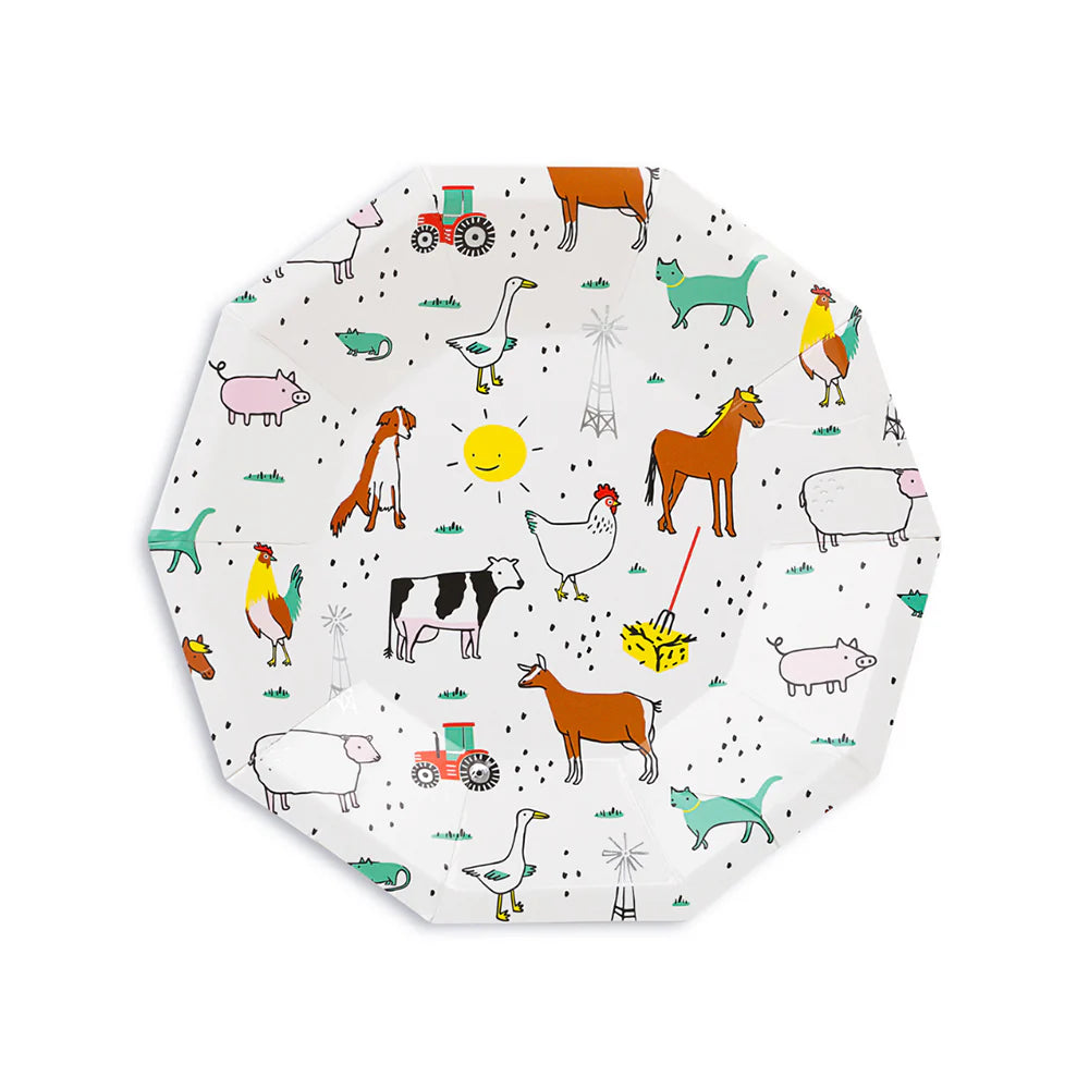 Close‑up of octagon paper plate featuring illustrated cow, horse, rooster, tractor, and sun.