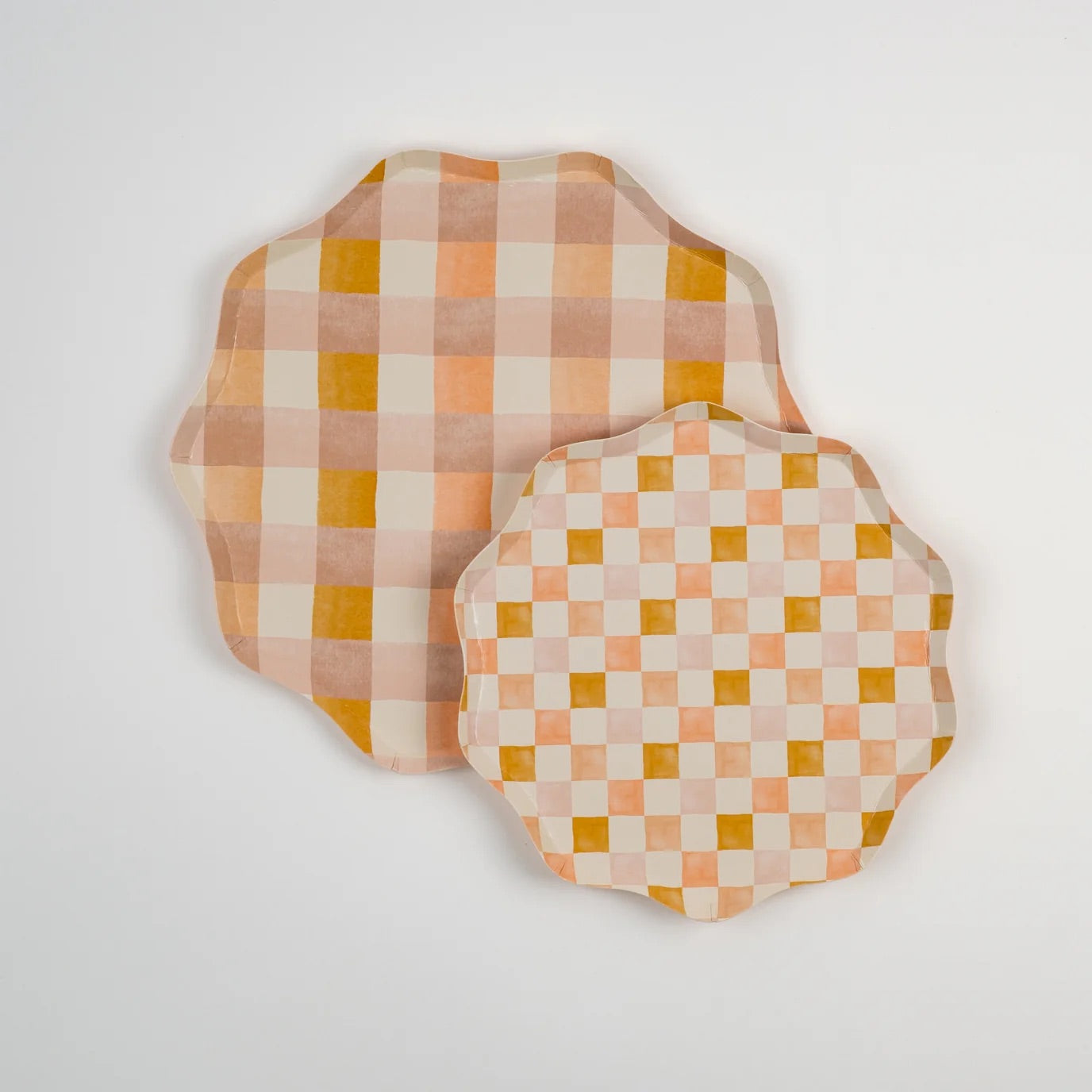 Harmony Dinner Plates in packaging, showcasing a gingham-inspired checkered pattern in warm pastel tones. Ideal for baby showers, Easter, and stylish tablescapes.