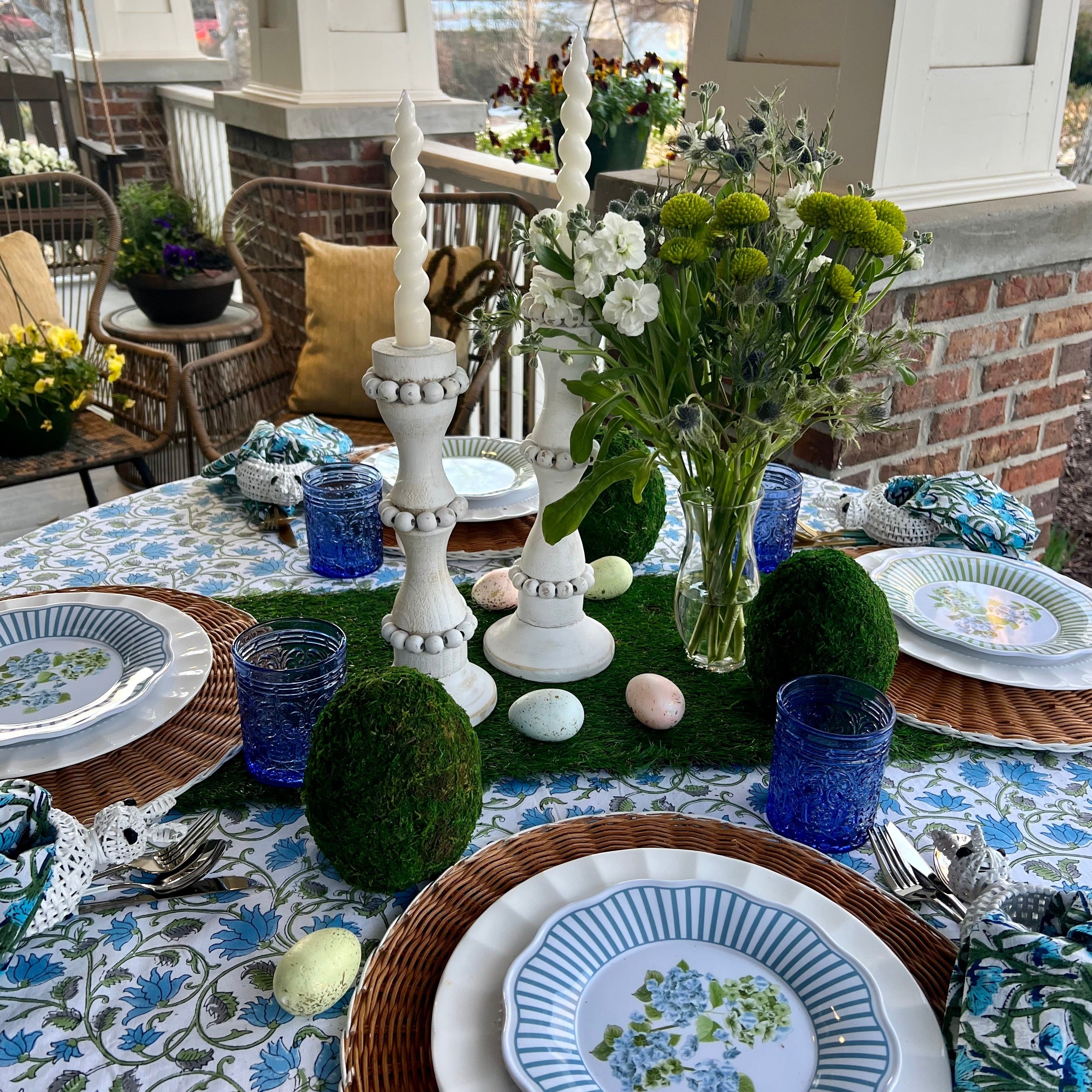 White wooden candle holders that are perfect to use as a centerpiece or throughout the home. These tall candlestick holders are perfect to gift to Mom for Mothers Day