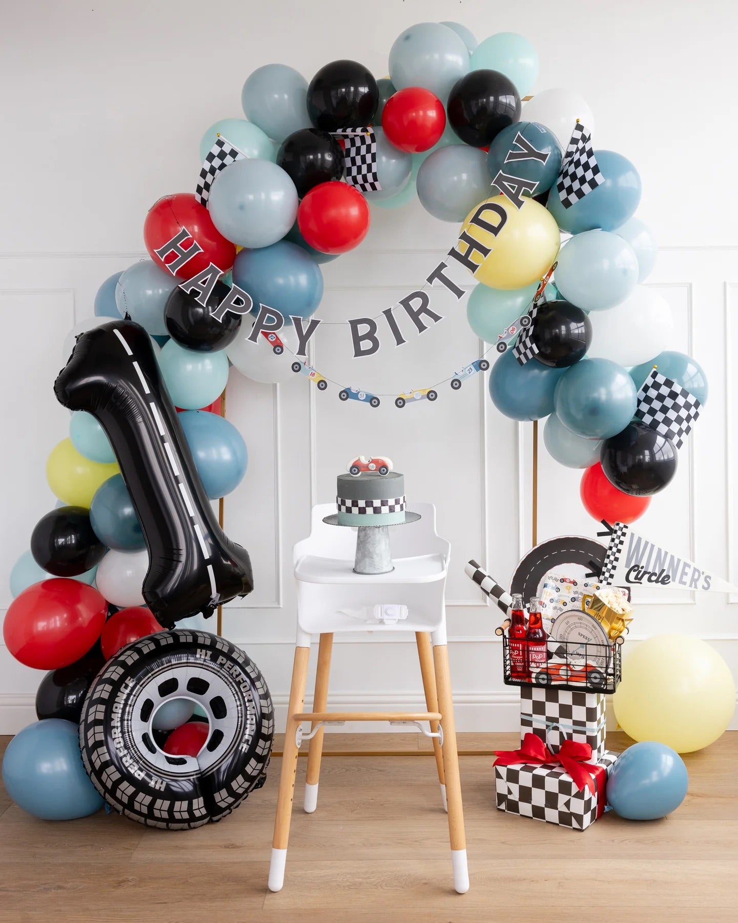 Packaged Miles Per Hour Happy Birthday Banner Set ready for easy setup and vibrant display at a birthday party.
