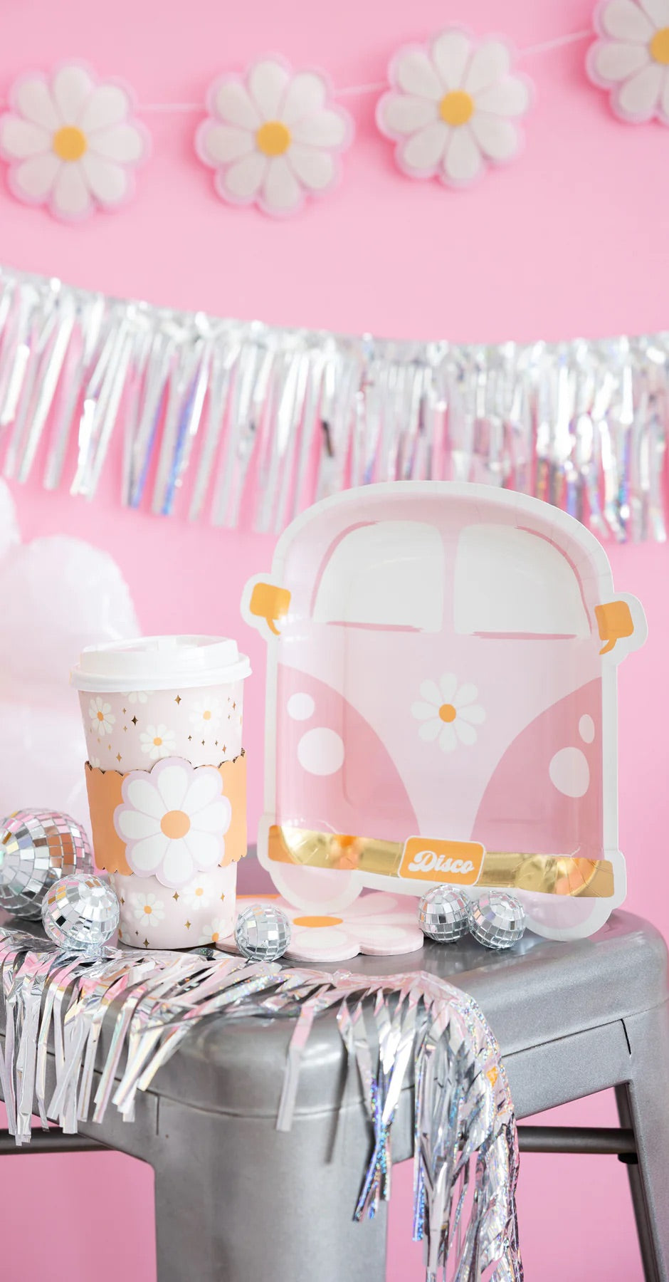 Colorful vertical display featuring disco daisy van plate, sparkling fringe, daisy banner, and cheerful disco-theme details against pink backdrop.