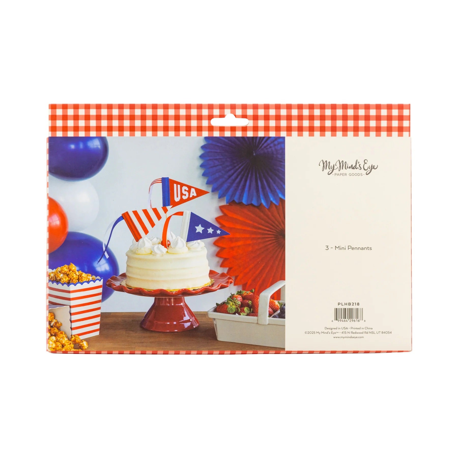 Patriotic felt pennants decorating a white frosted cake, perfect as a cake topper for a red, white, and two birthday.