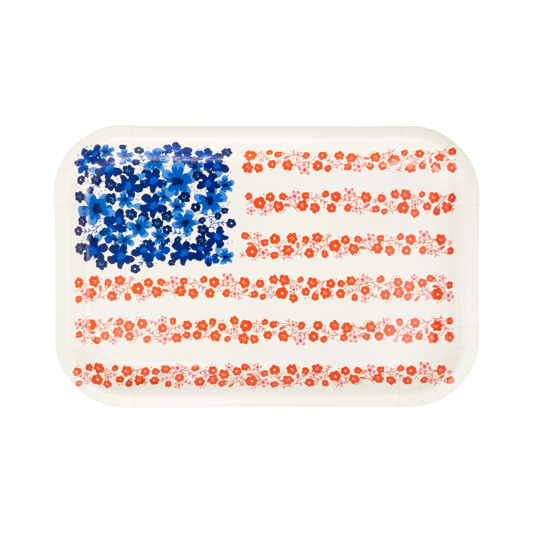 Close-up of a girly patriotic plate featuring blue and red flower patterns arranged as the stars and stripes.