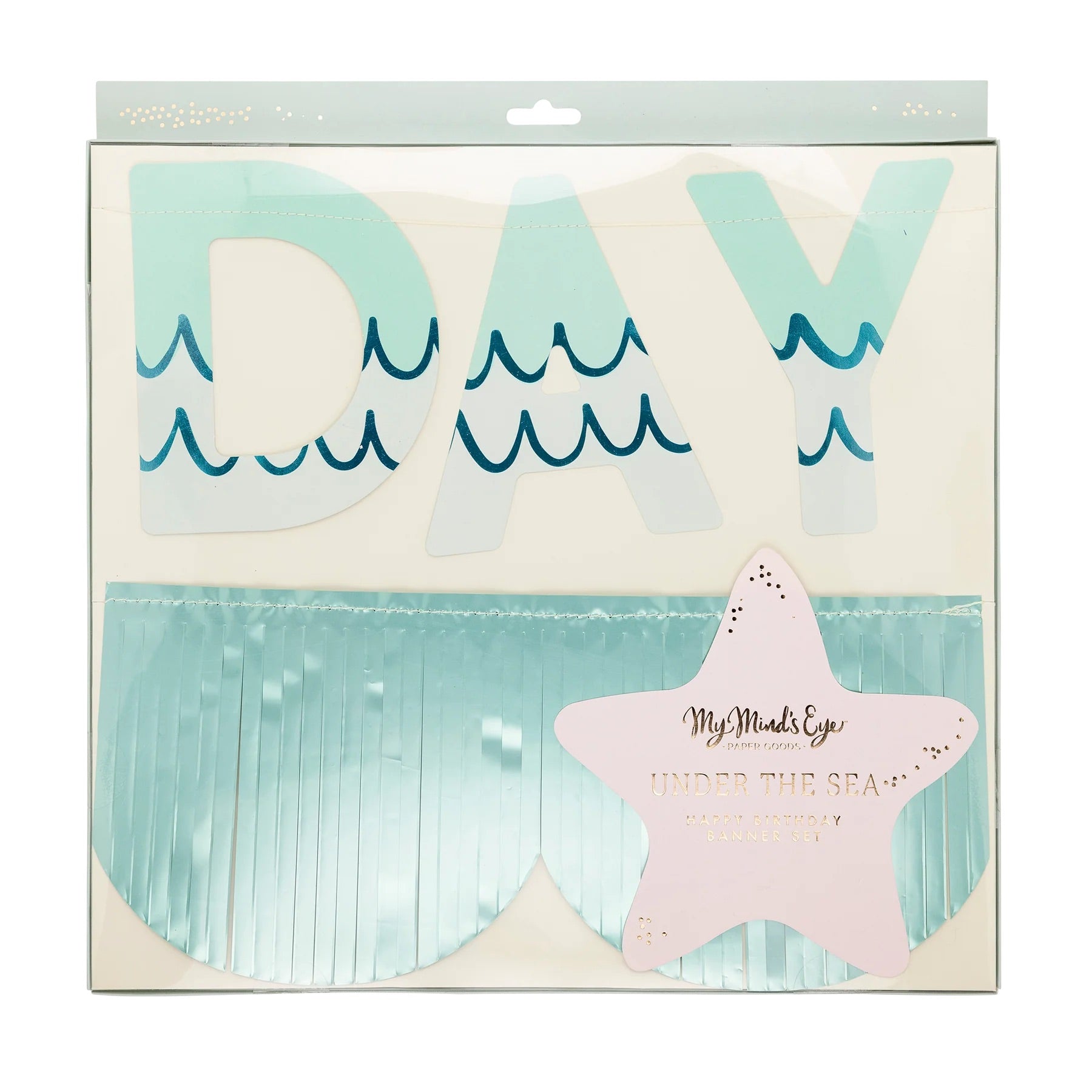 Close-up of packaged mermaid banner set highlighting aqua foil letters with playful wave accents and a shimmering aqua fringe garland.