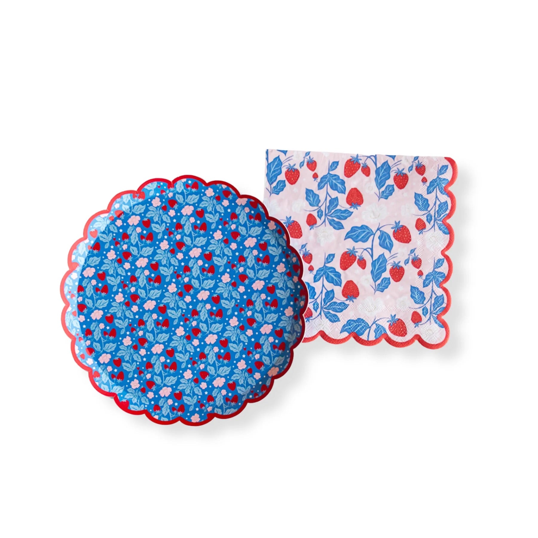 A coordinating strawberry-themed napkin and plate set, featuring a vintage-inspired red, blue, and pink floral design.