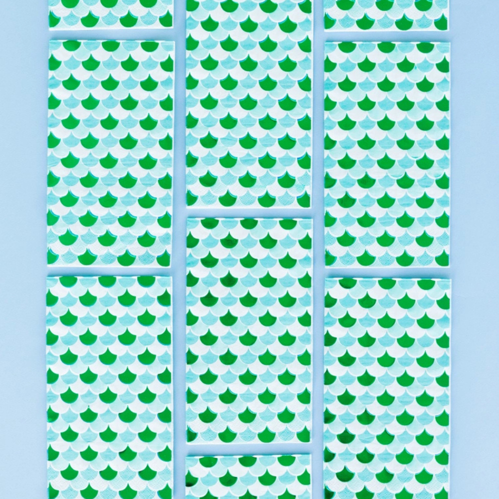 Arrangement of 16 Shell Yeah Guest Napkins in a grid, highlighting their aqua scale pattern with green foil.