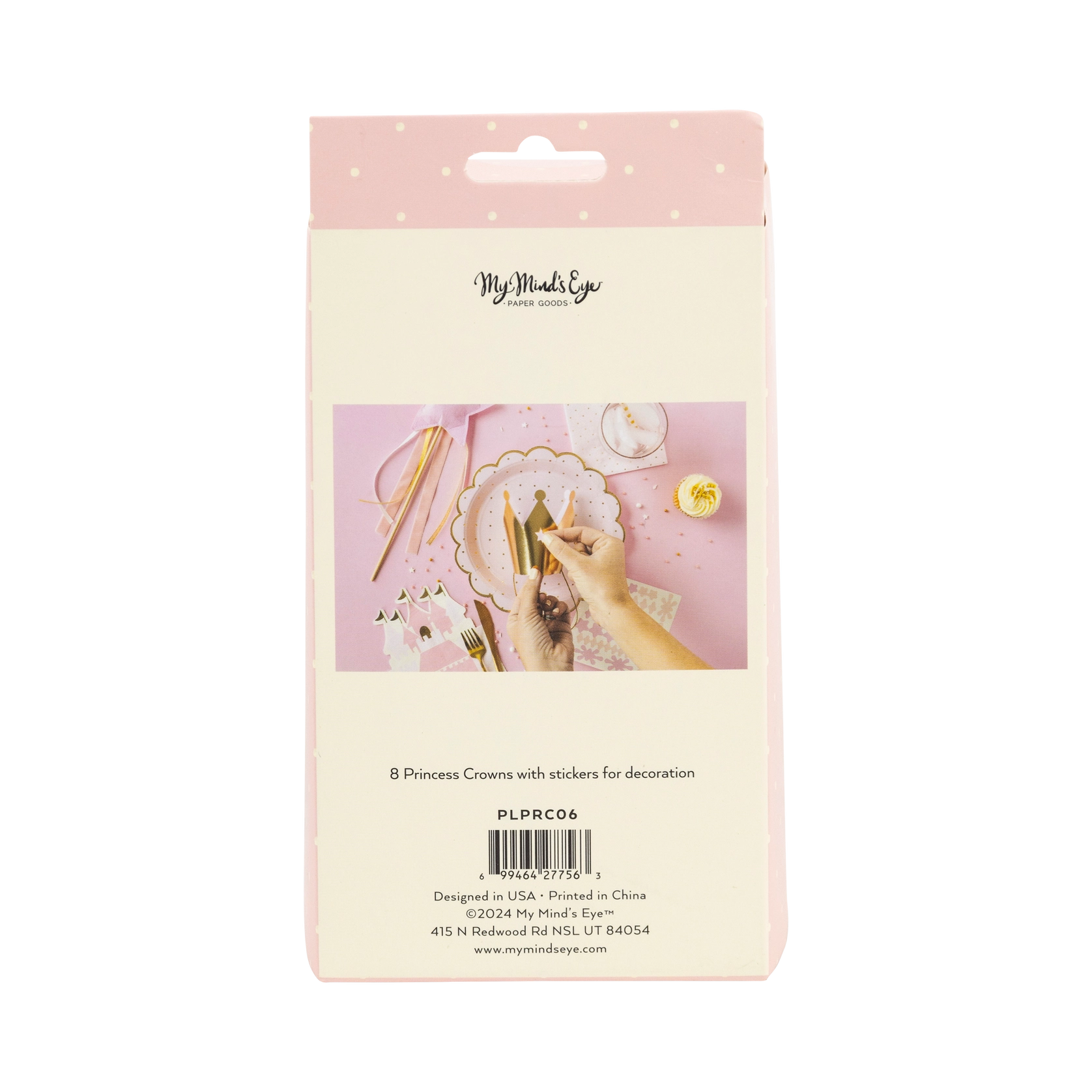 Back of Princess Crowns craft kit showing hands decorating gold tiara on pink table setup.