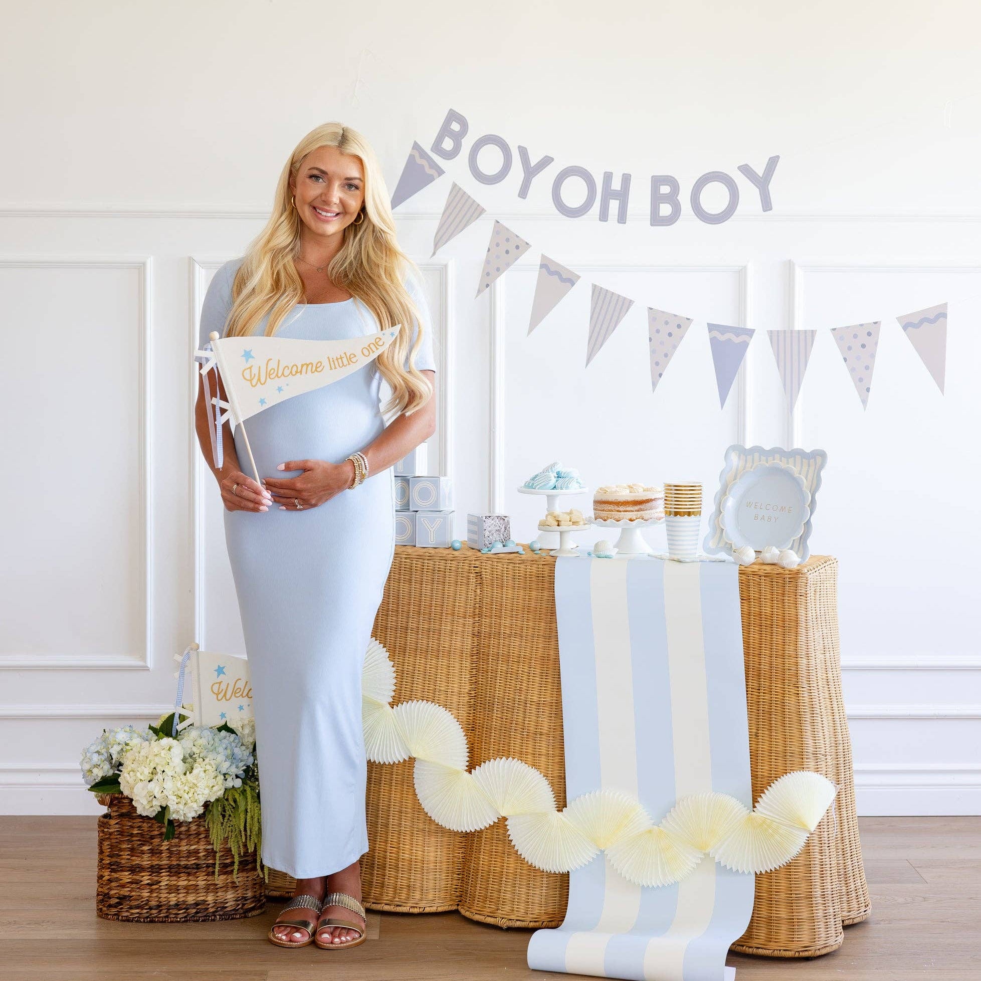Baby blue boy baby shower banner with “Boy Oh Boy” lettering above dessert table
