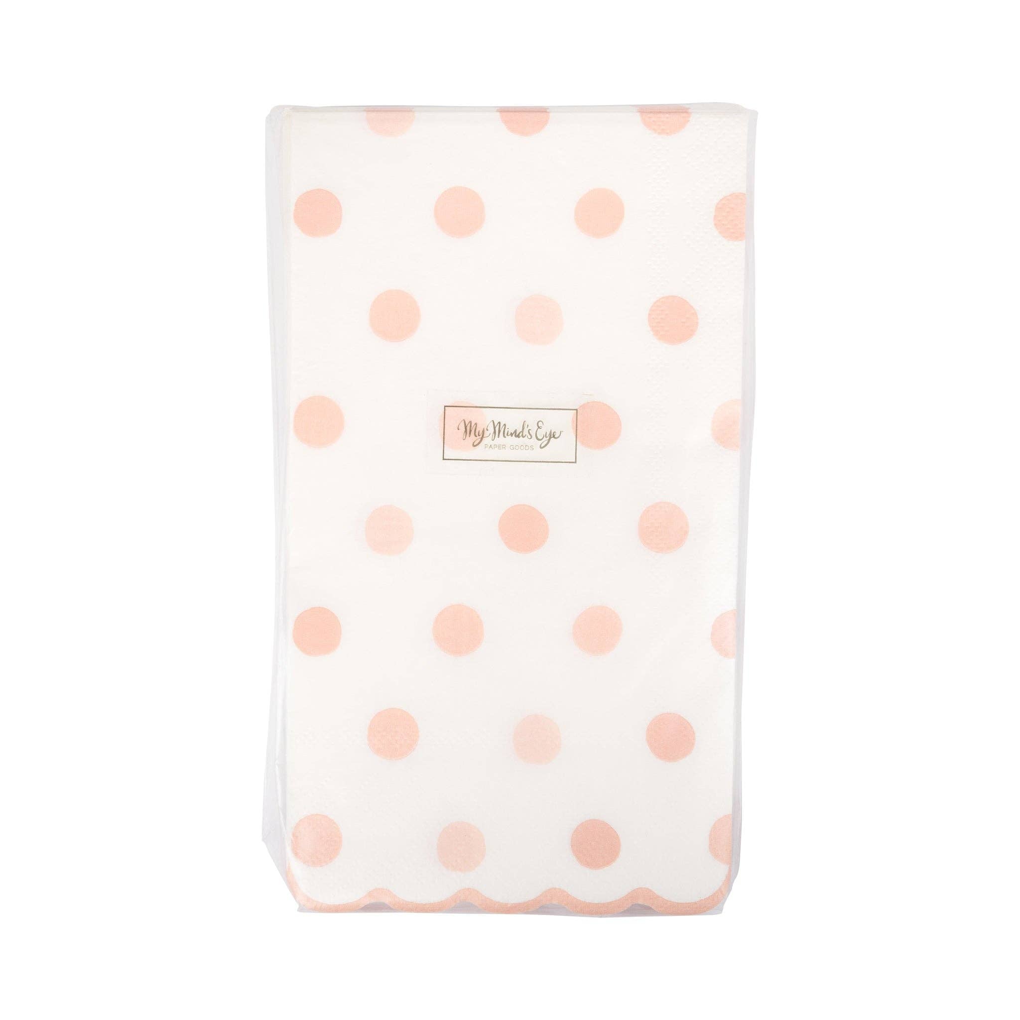 Packaged baby pink polka dot paper dinner napkins front view