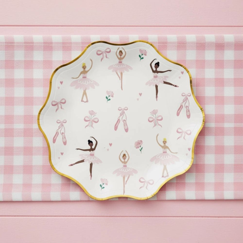 Overhead view of ballerina plate on a pink and white gingham runner