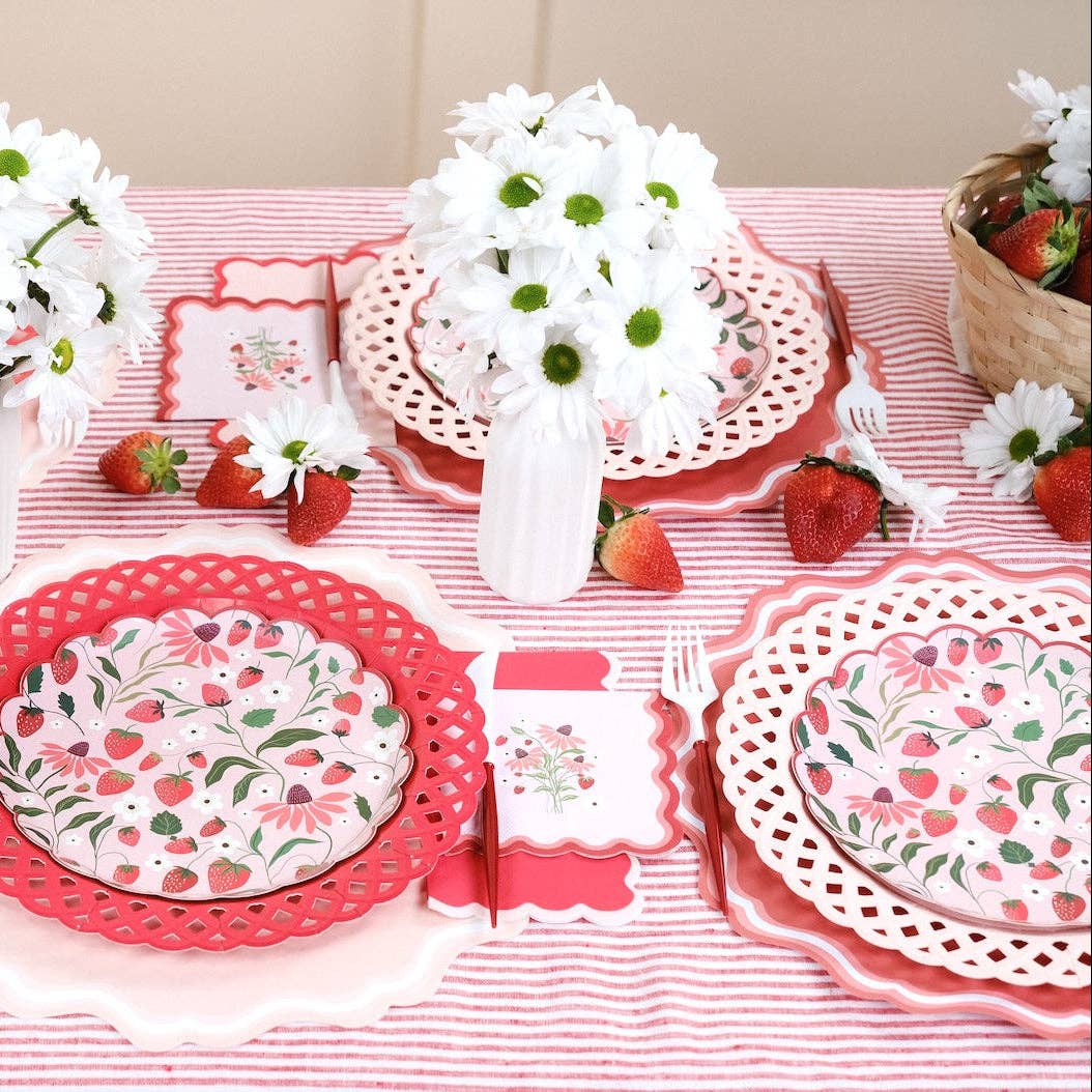 Strawberry Cocktail Napkins styled on a pink striped table for a Berry First Birthday party.