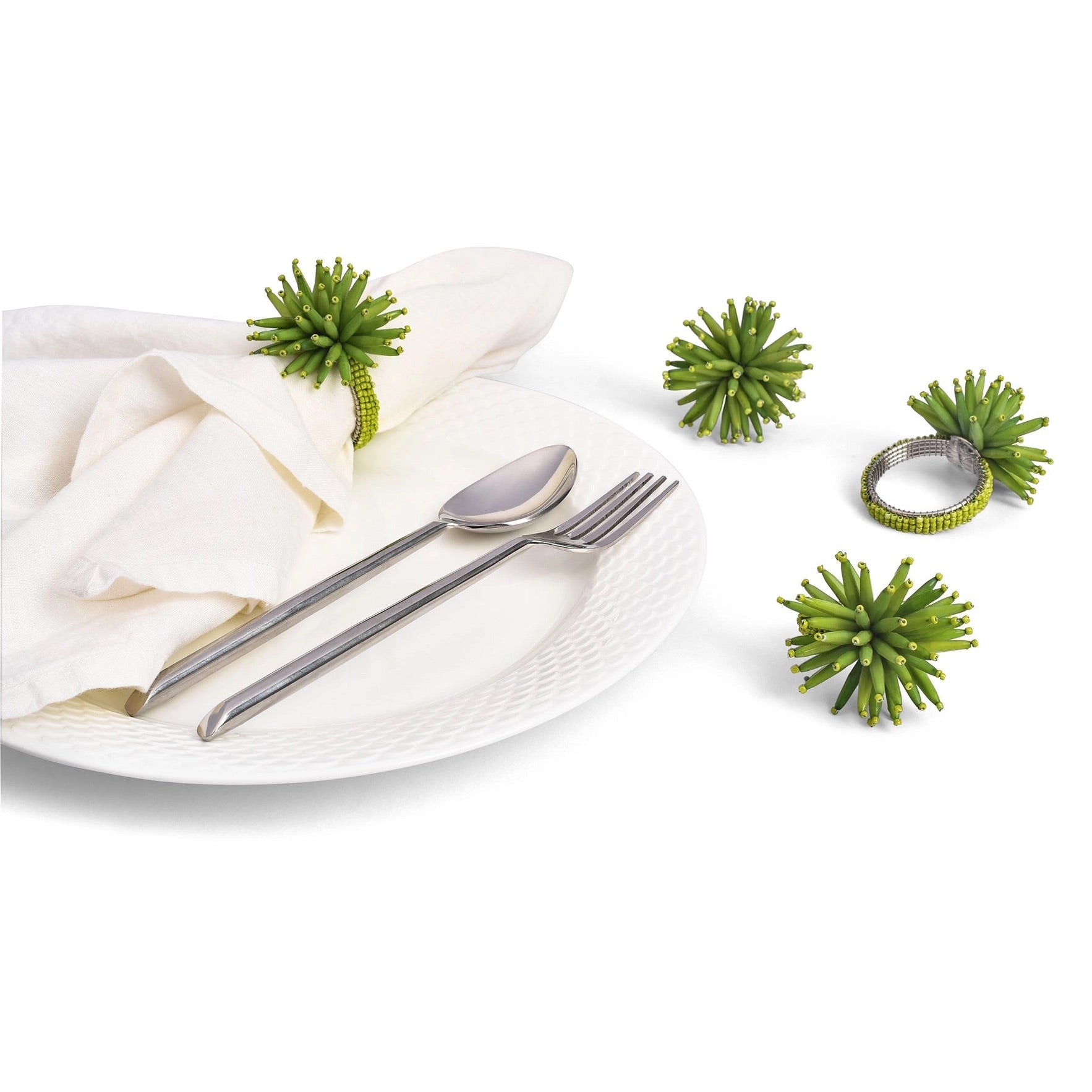 Green beaded napkin rings. 