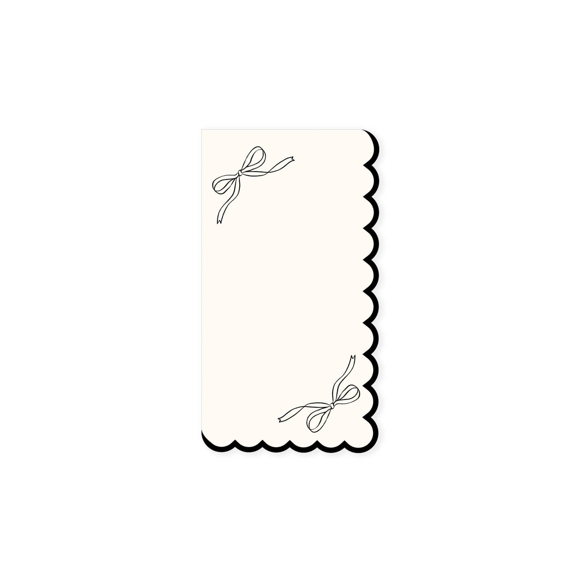 Single napkin product photo: Ivory cocktail napkin with black bow illustrations and scalloped edges from the Tying the Knot collection.