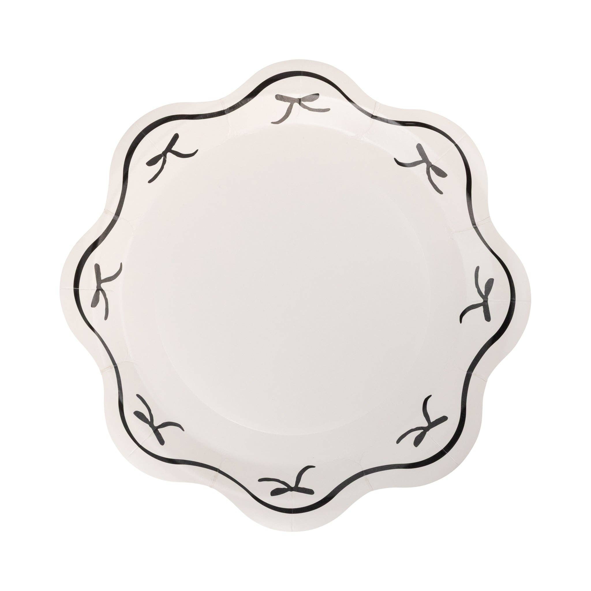 Black bow scalloped paper plate with black border on white background