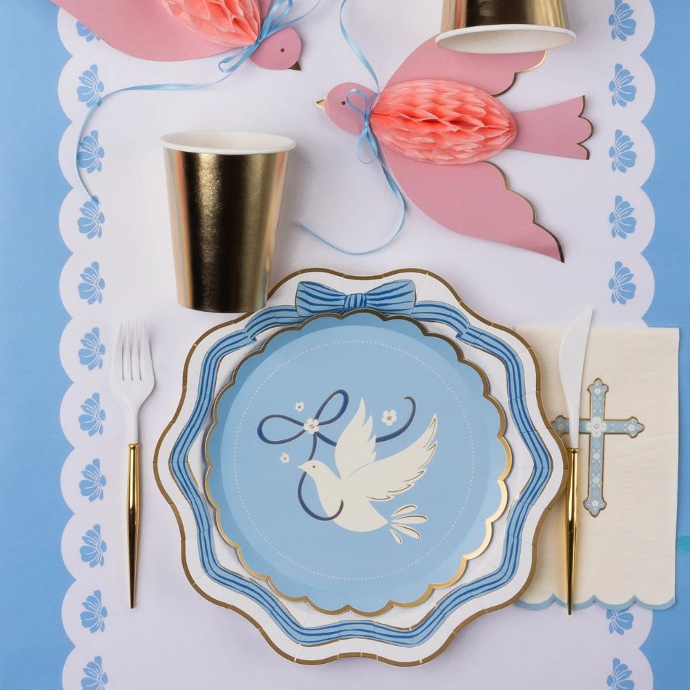 Blue bow dinner plate with gold foil edge styled for baptism party