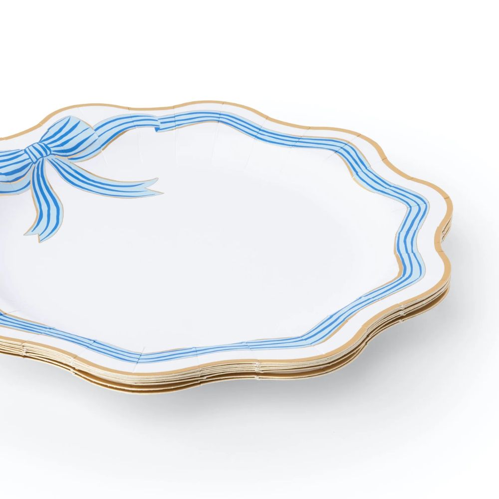 Stack of blue and gold bow dinner plates
