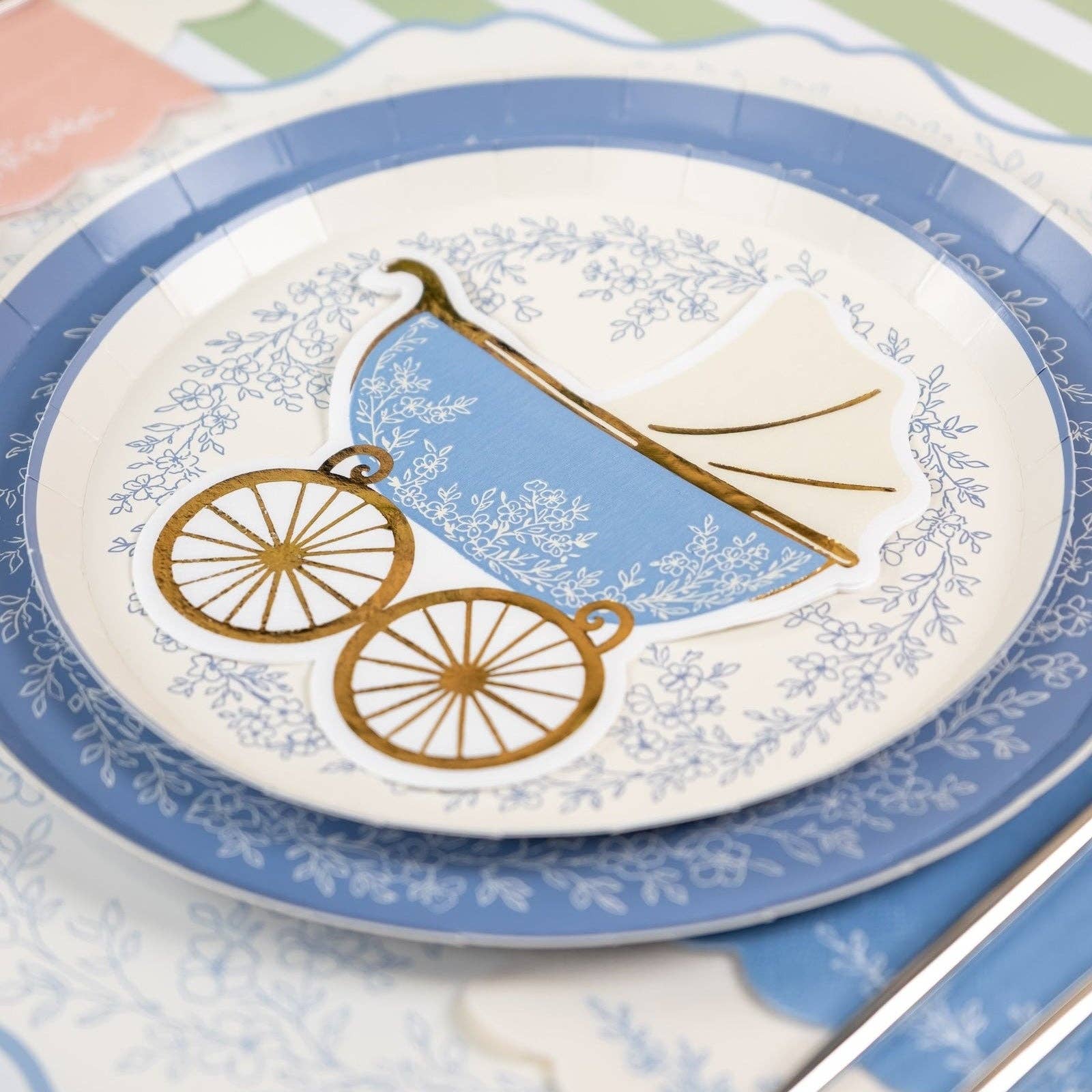 blue floral paper plates table setting for baby shower