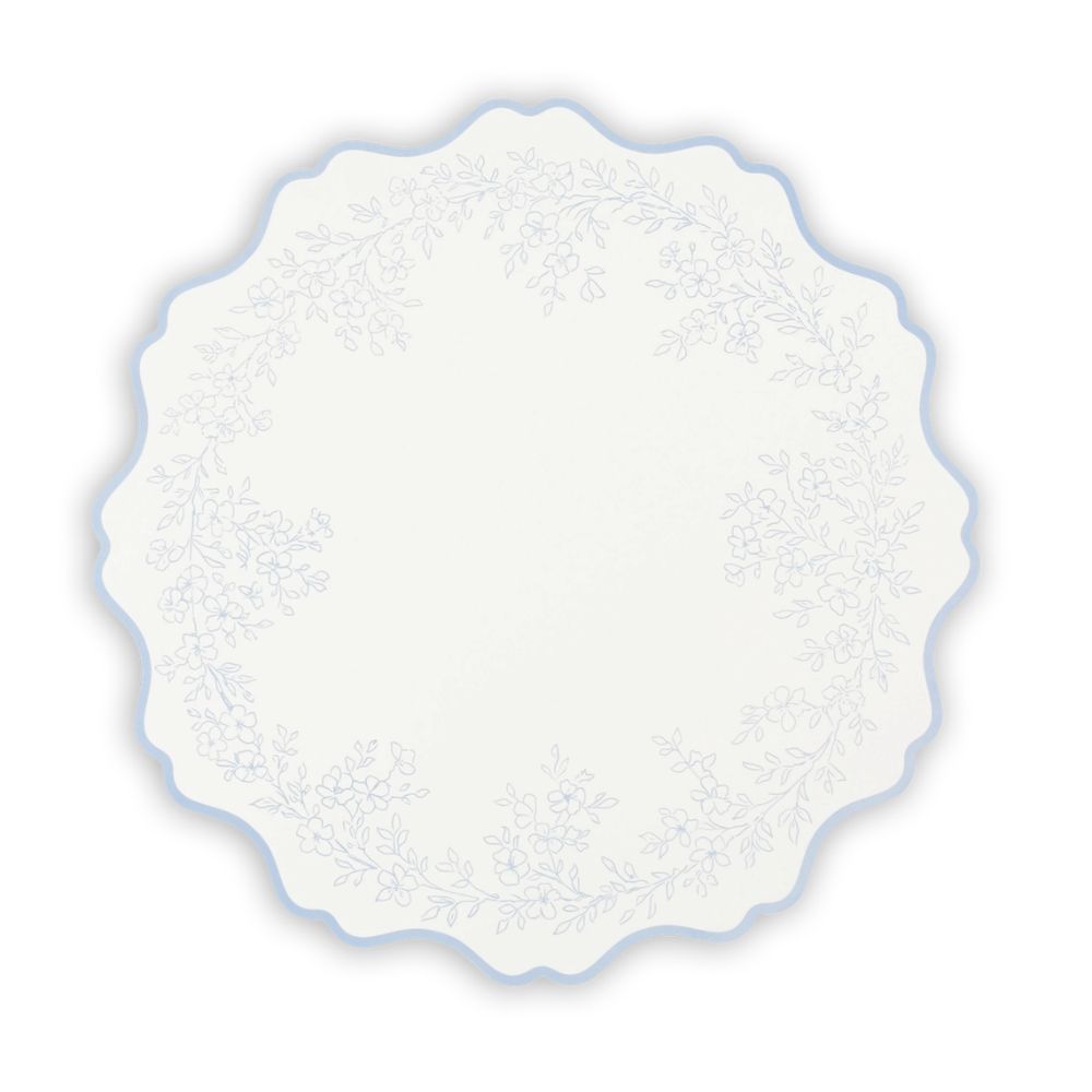 blue floral scalloped placemat with botanical wreath design.