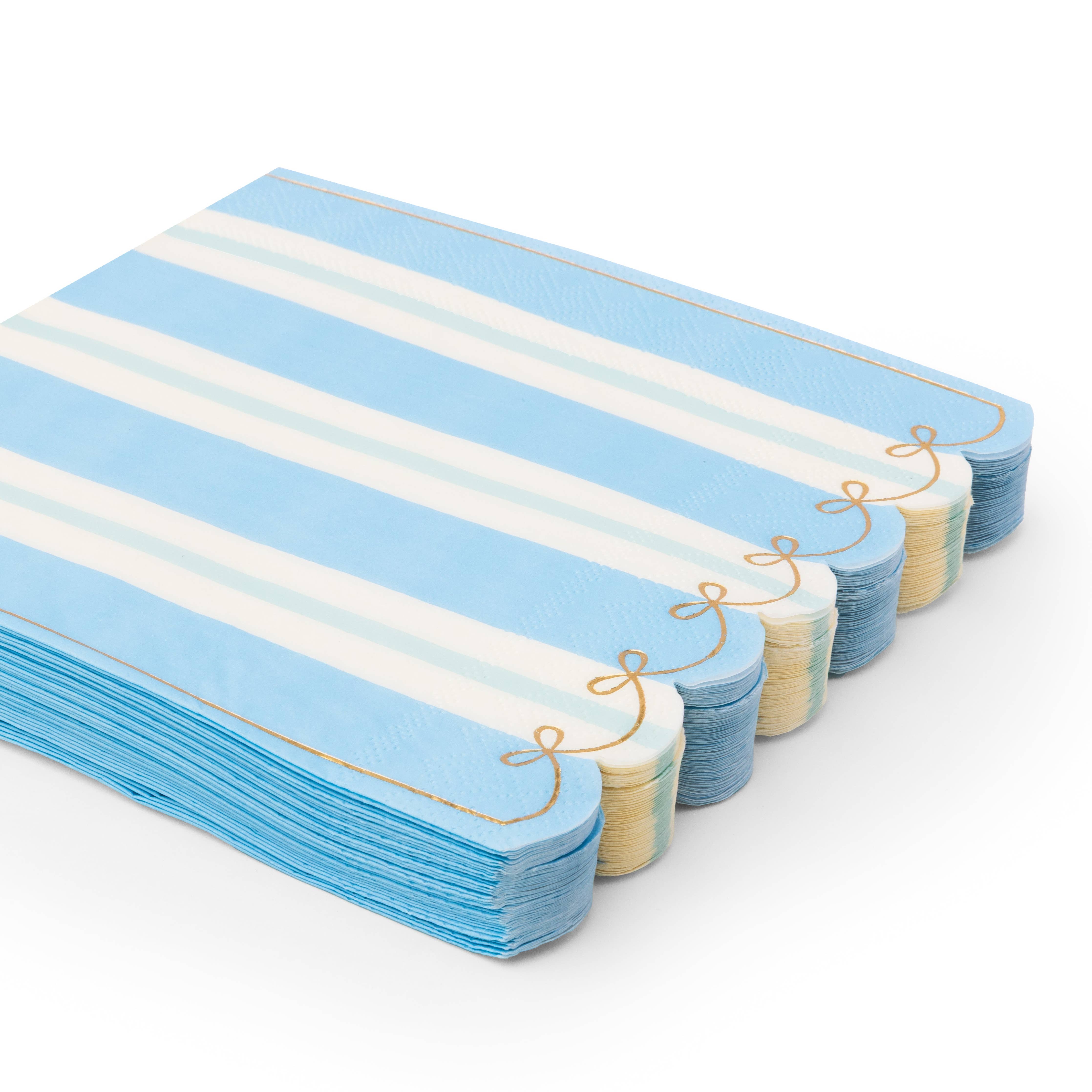 Stack of blue and mint striped napkins with gold foil bow detail