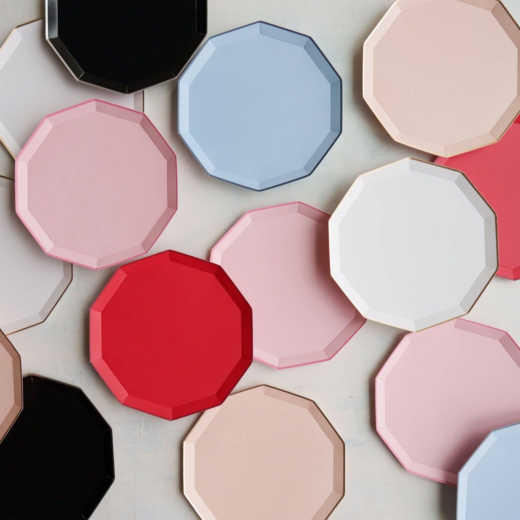 Assorted Signature Line plates in multiple colors including Sweet Peach