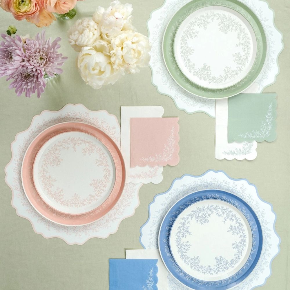 botanical placemat with dessert plate and table setting.