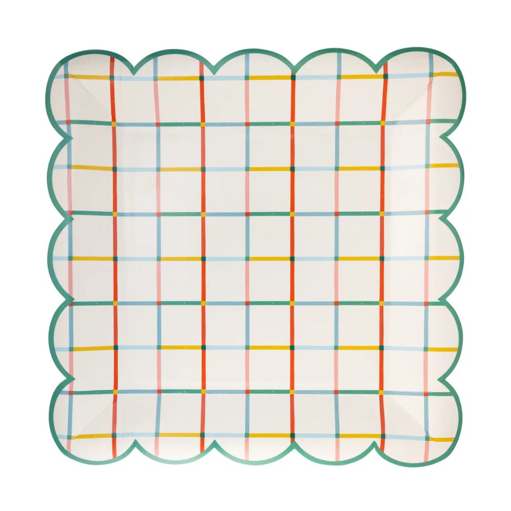 Colorful grid scalloped paper plate front view.