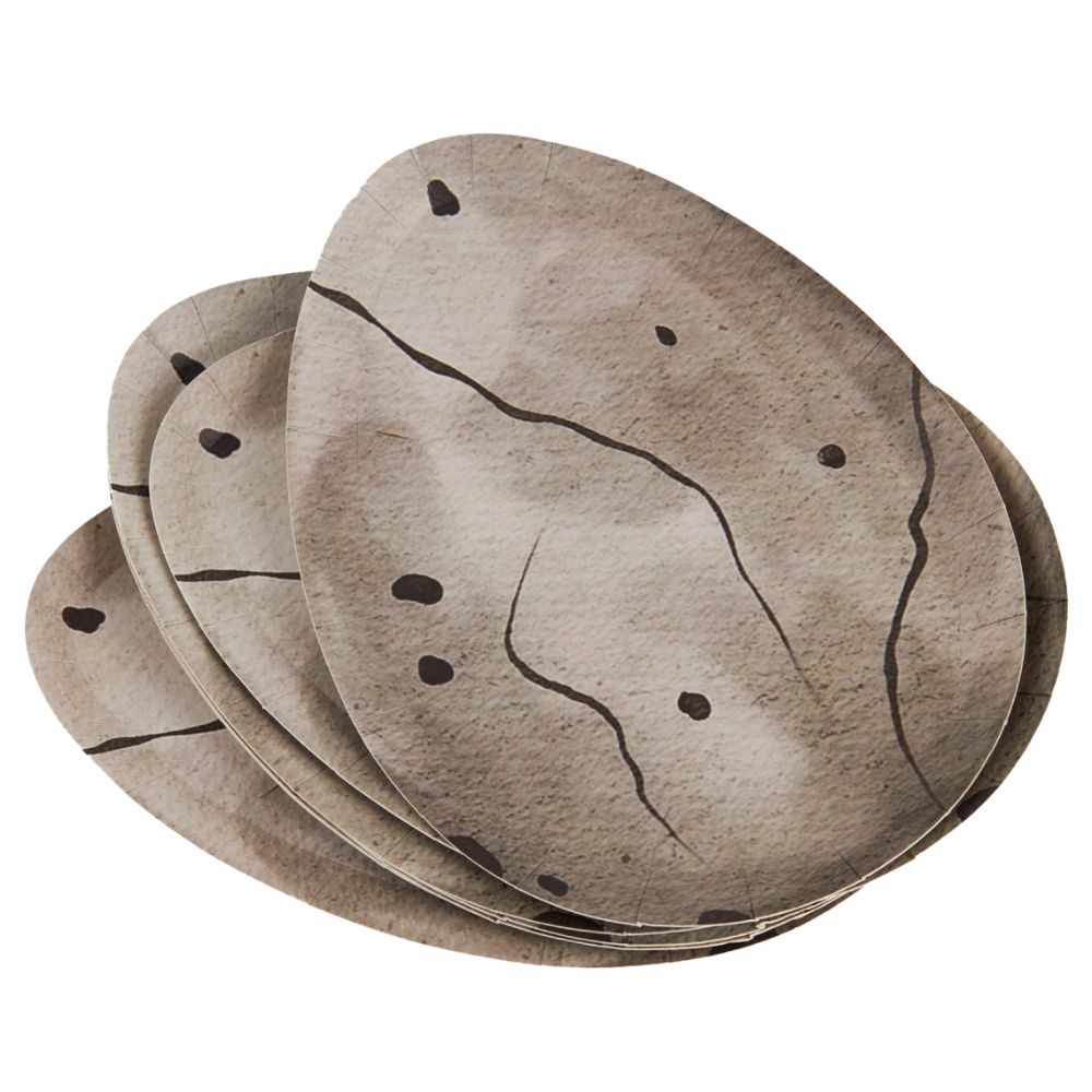 Stack of dinosaur egg shaped paper plates with cracked egg design
