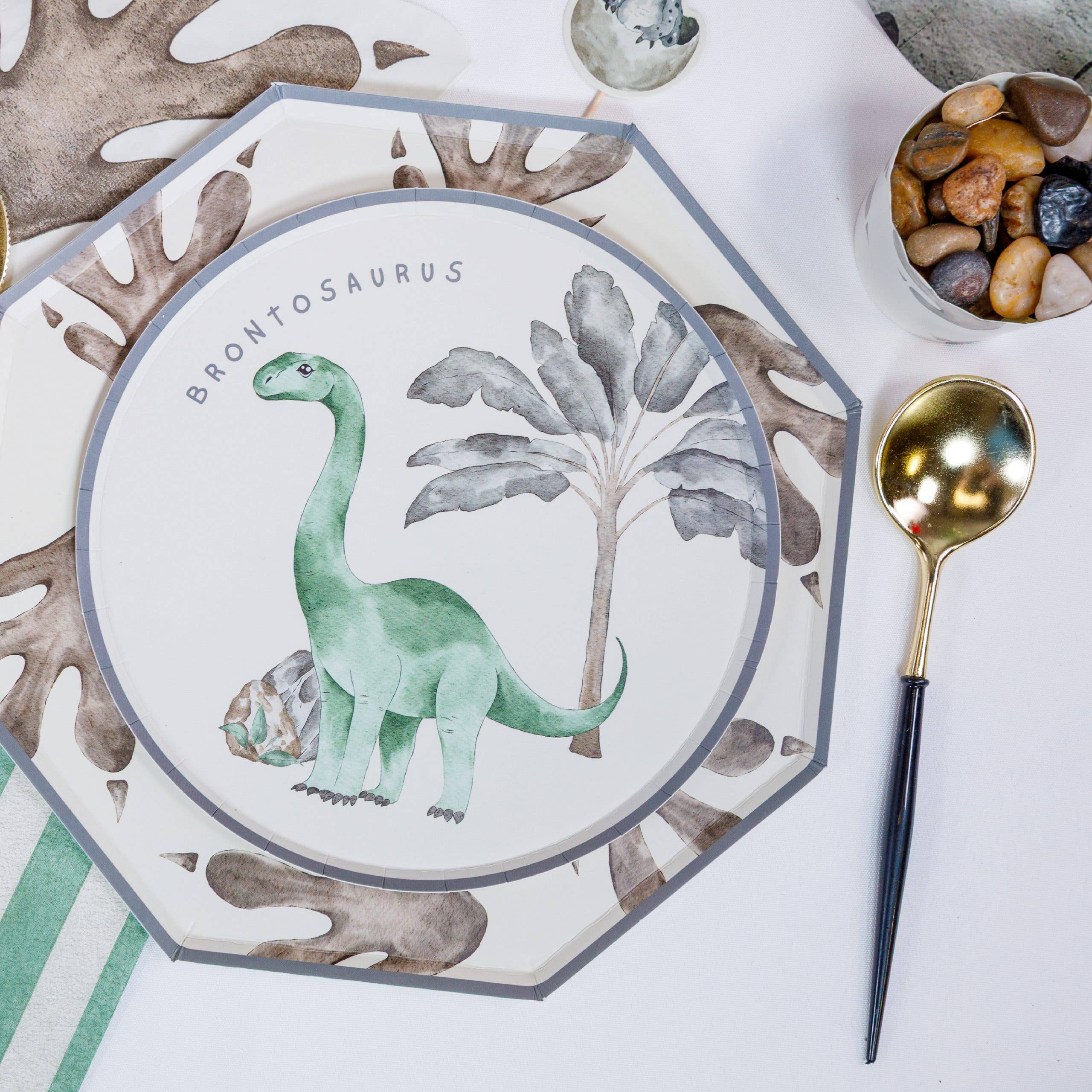 Dinosaur footprint plate styled with dinosaur dinner plate and party setup

