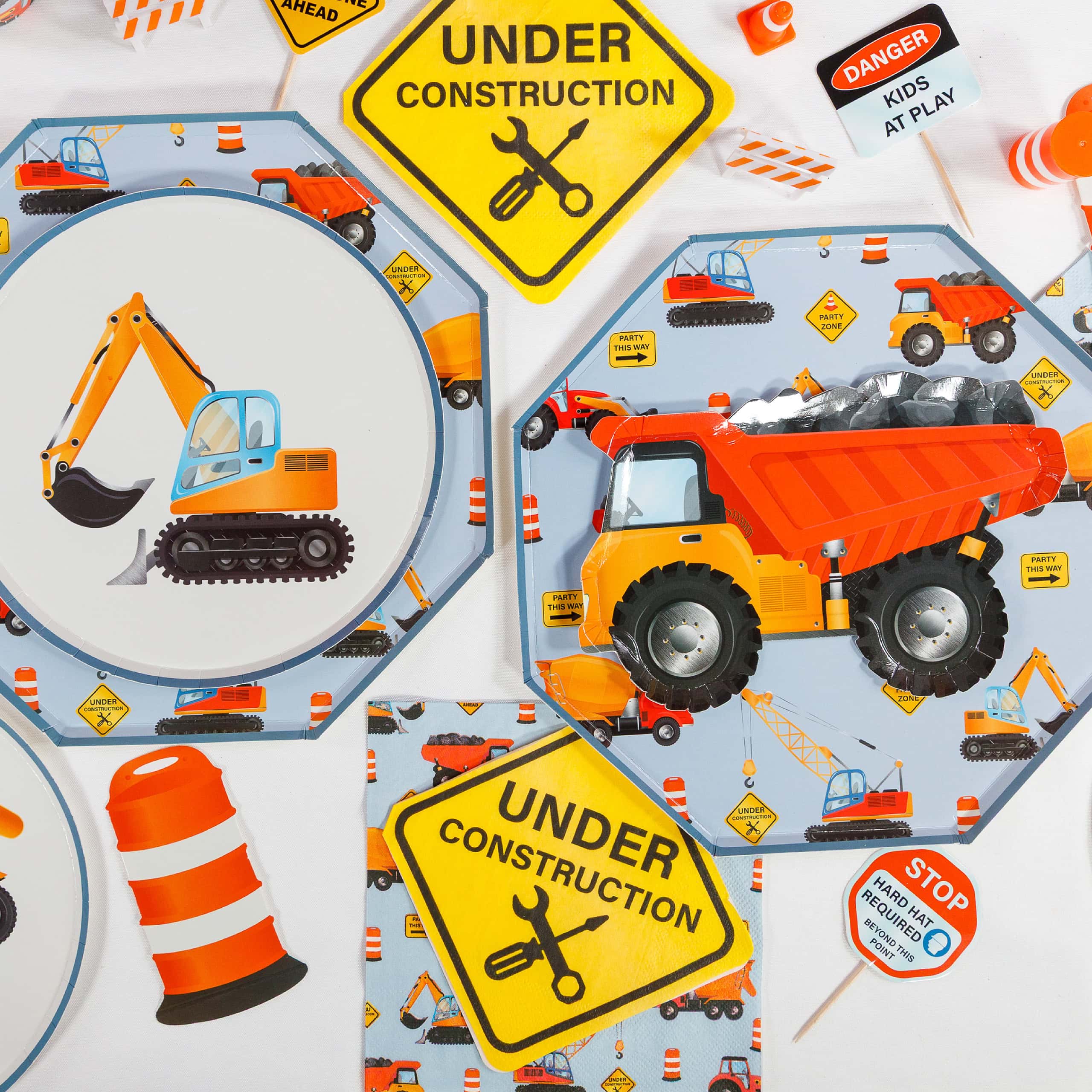 construction themed table with truck plates and matching decor