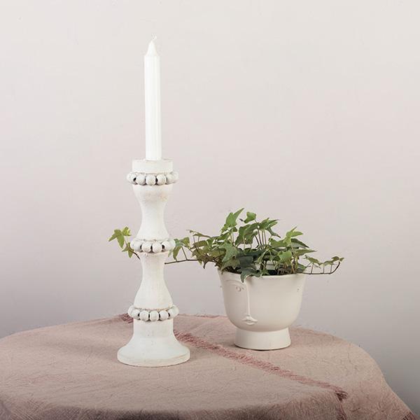 White wooden candle holders that are perfect to use as a centerpiece or throughout the home. These tall candlestick holders are perfect to gift to Mom for Mothers Day