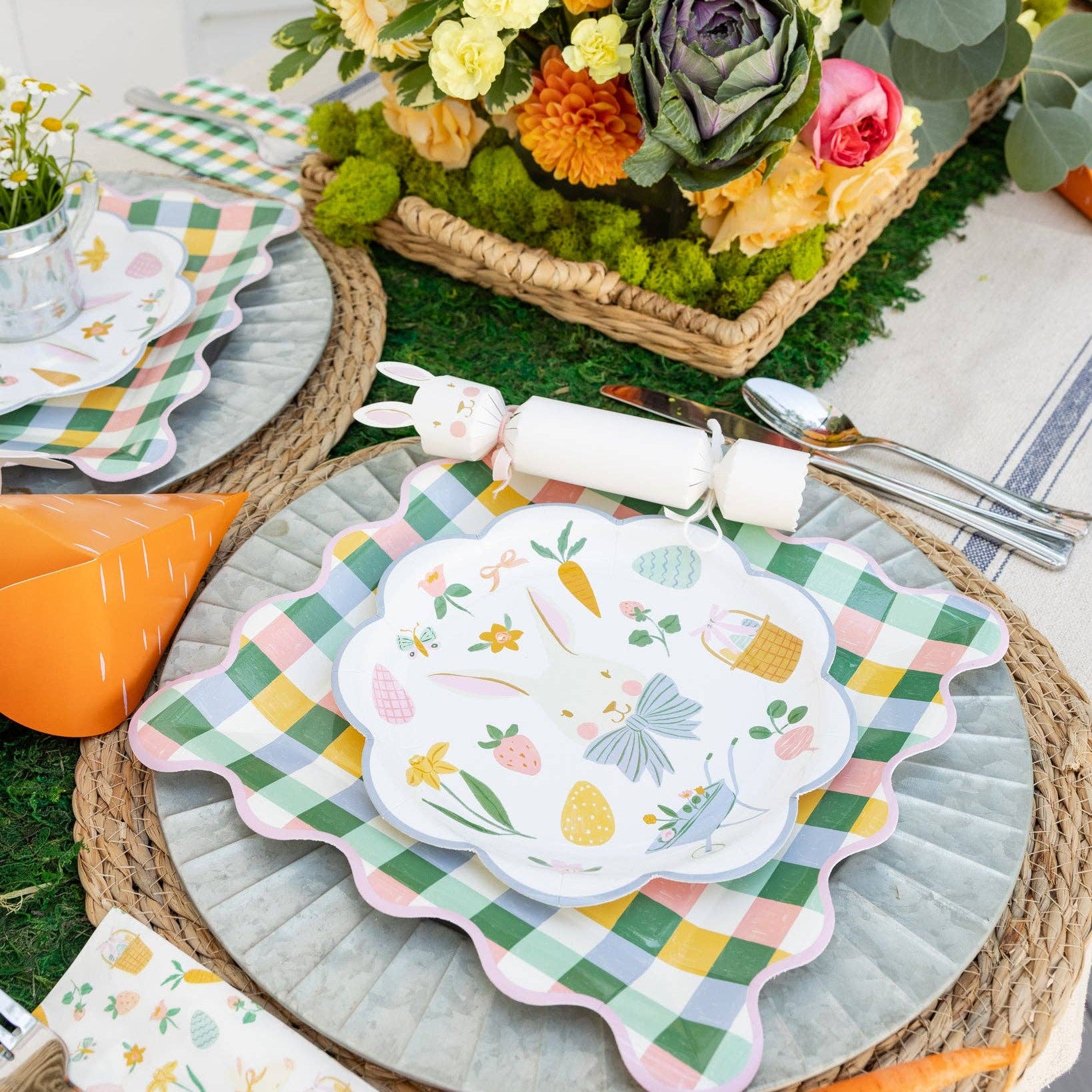 Easter table setting featuring Easter icons plate with gingham layers