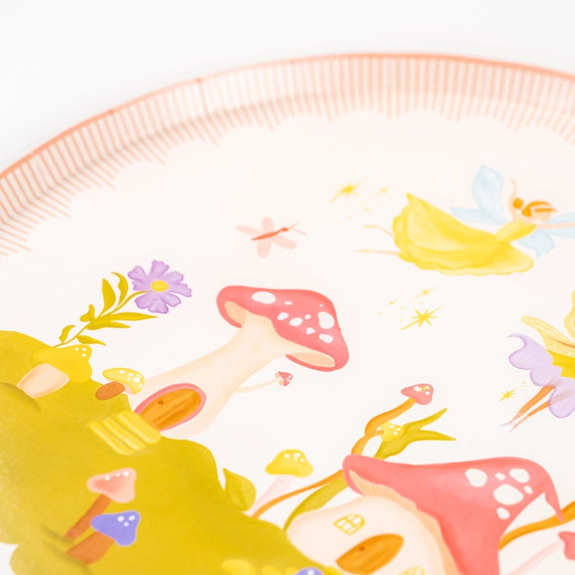 Close-up of fairy garden plate with pink toadstools—perfect for a fairy birthday party.