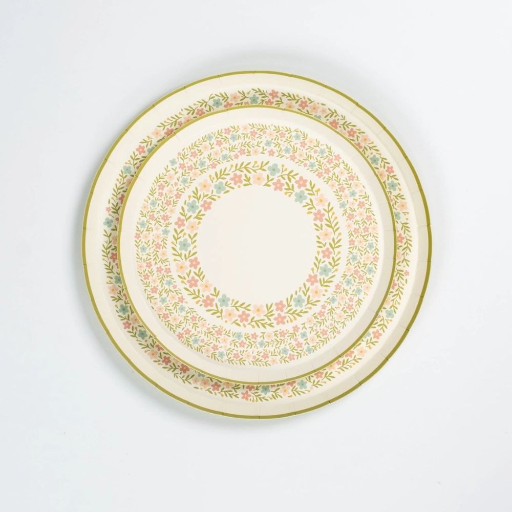 floral meadow dinner plates stacked showing sage rim and pastel flowers.