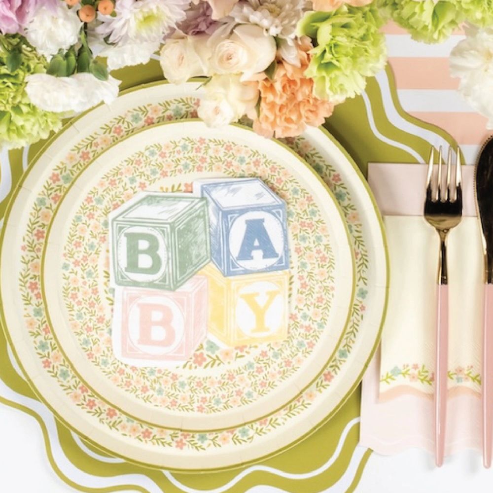 floral paper plates large with baby shower table setup.