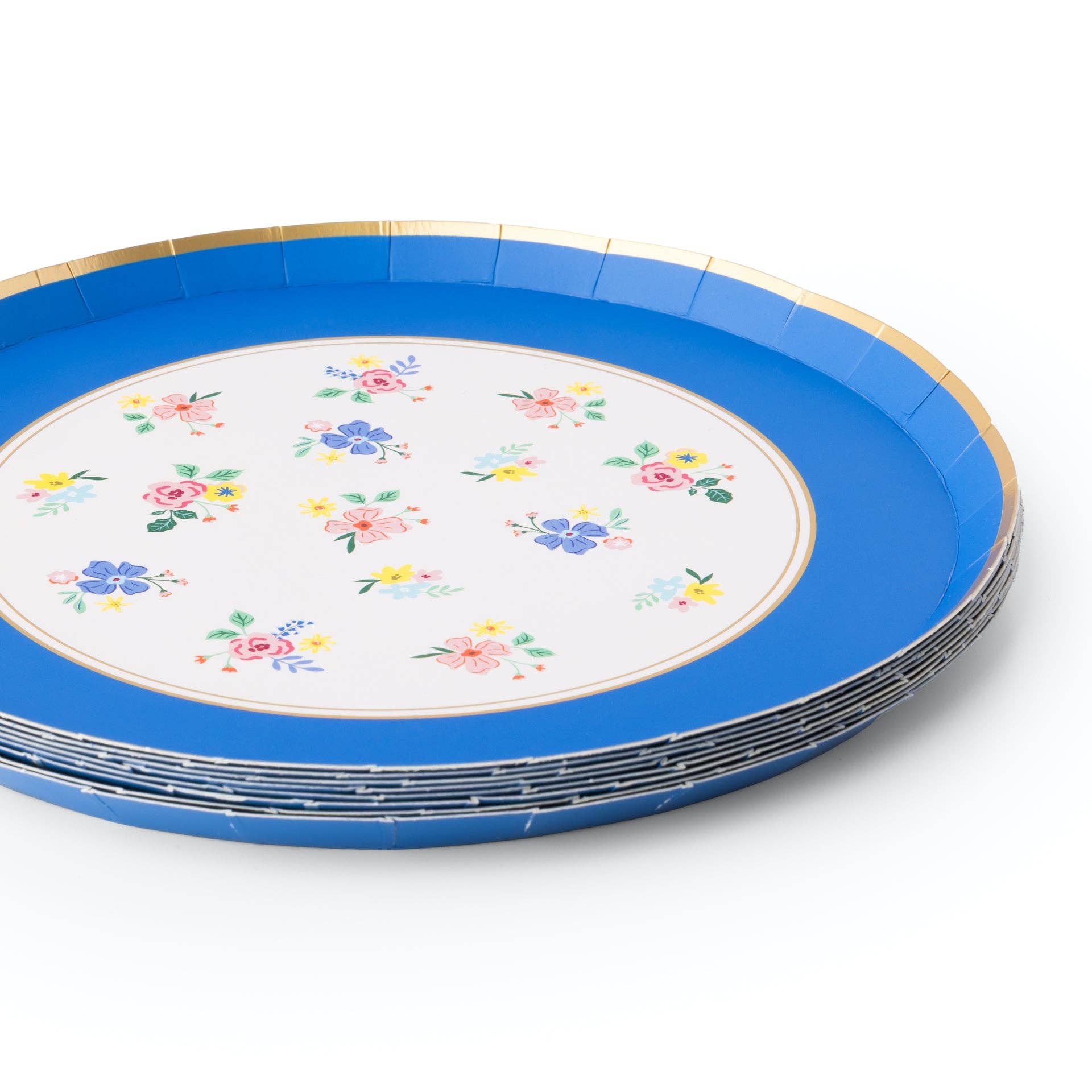 Stack of floral dessert plates with blue rim and small flower pattern.
