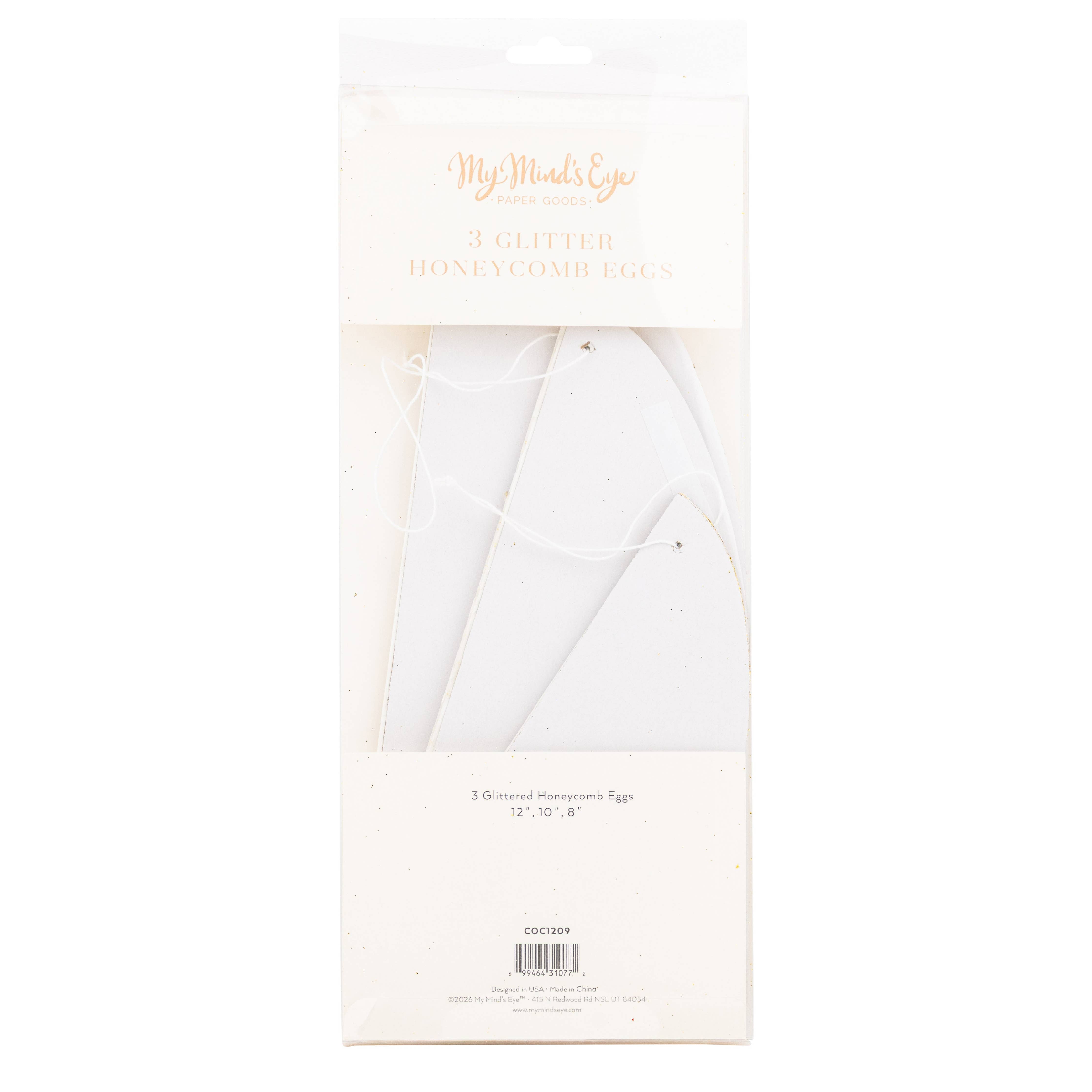 Packaging showing three glittered honeycomb eggs and hanging strings.