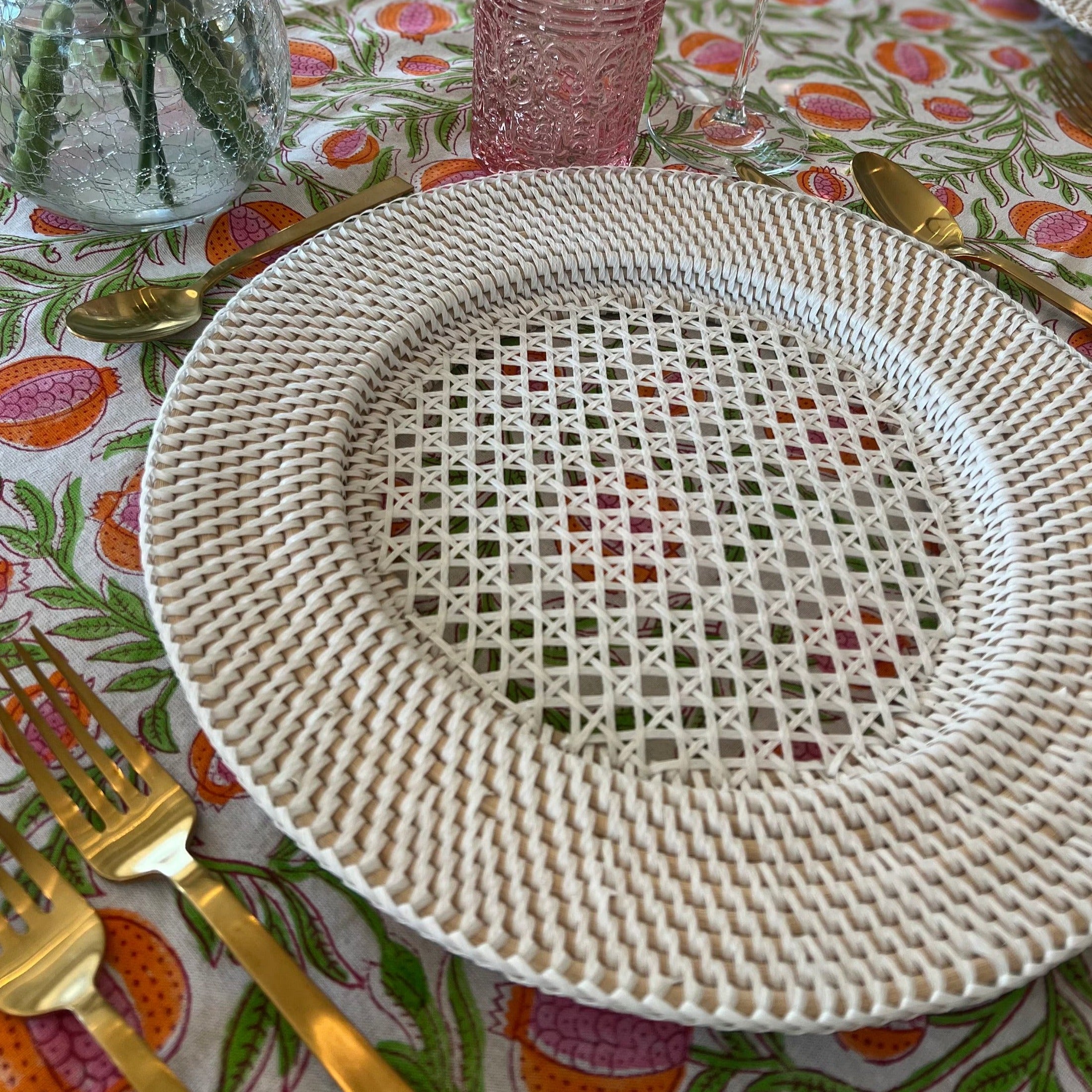 Bring the coast to your table with our White Rattan Charger Plates. These White Placemats are an essential part of creating a Tropical Tablescape, ideal for adding a touch of summer to any event. At 13.7 inches, they're versatile for both daily use and special gatherings.