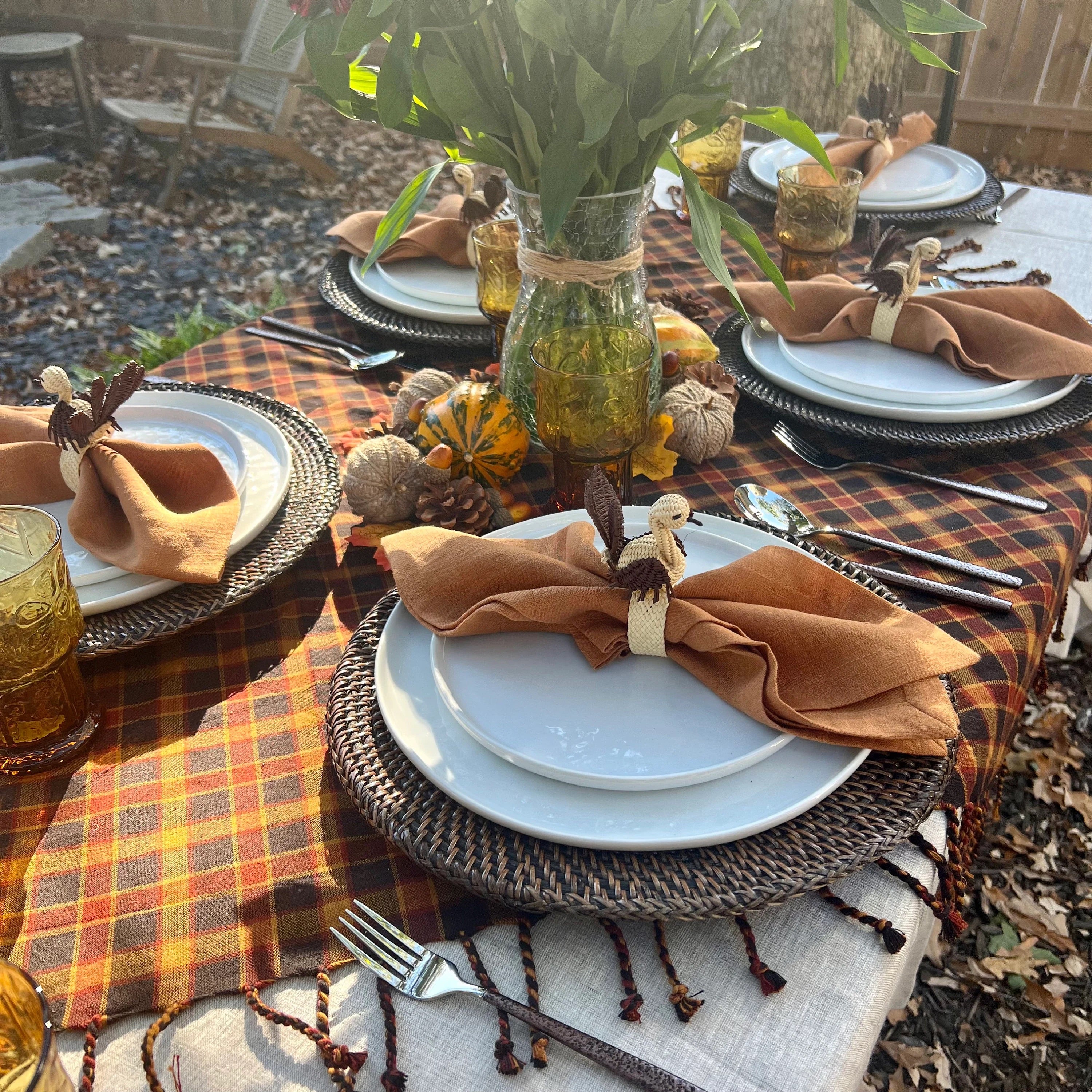 Discover the perfect blend of style and functionality with our Dark Brown Rattan Charger Plates. Crafted from natural wicker, these handmade boho charger plates fit standard dinner plates and add a chic, rustic touch to any meal. Ideal for those seeking brown placemats that combine durability with aesthetic appeal.