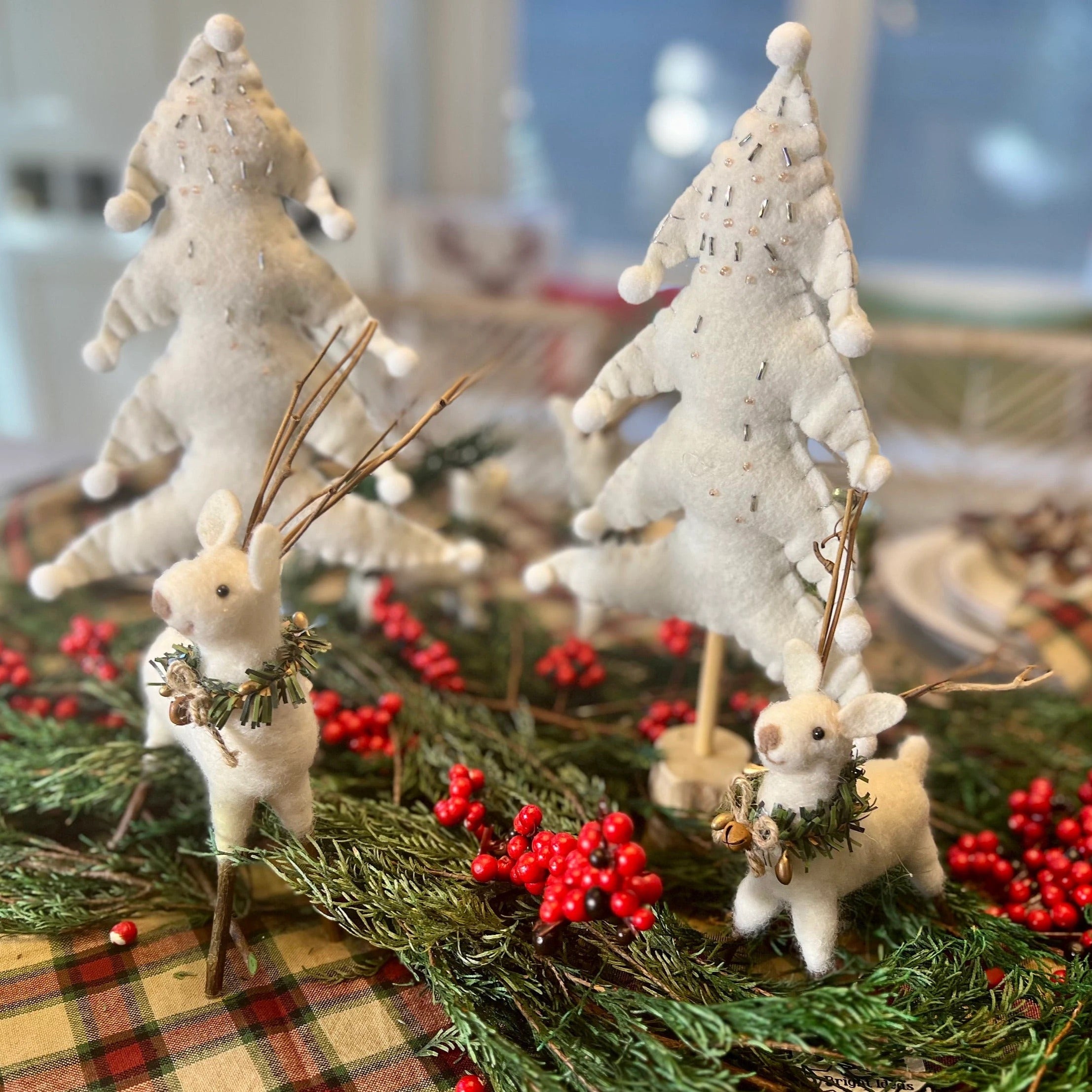 White felt Christmas tree perfect for your coffee table Christmas decor collection.